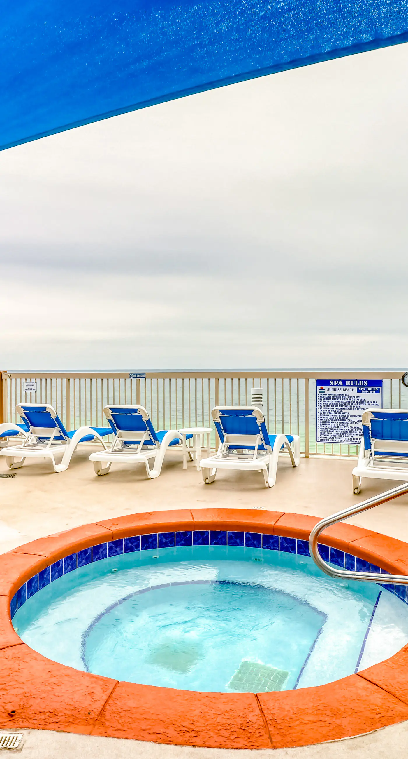 Elegant, beachfront condo with two pools, BBQ area & fitness room