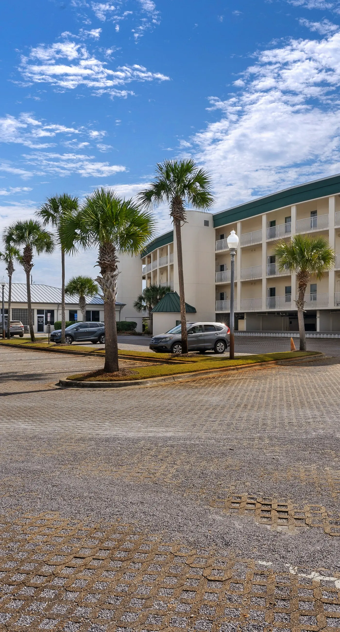 Condo with 2 stunning pools, hot tub, gym, partial Gulf view & pickleball