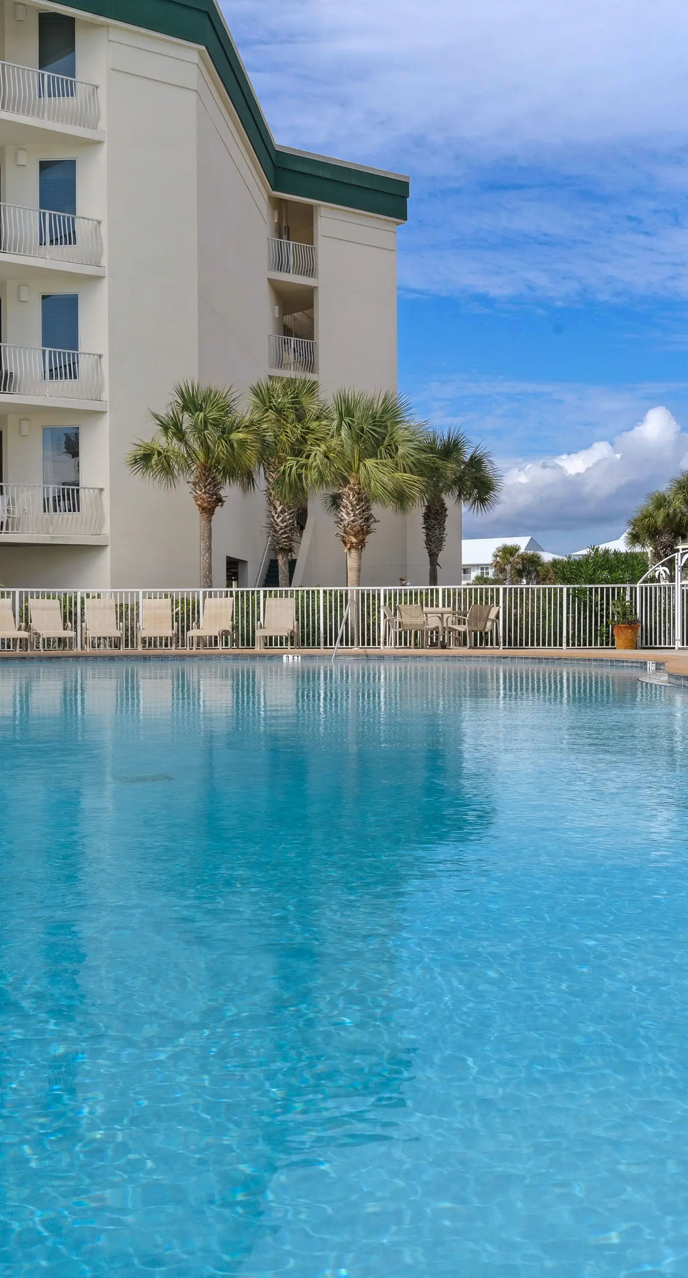 Condo with 2 stunning pools, hot tub, gym, partial Gulf view & pickleball