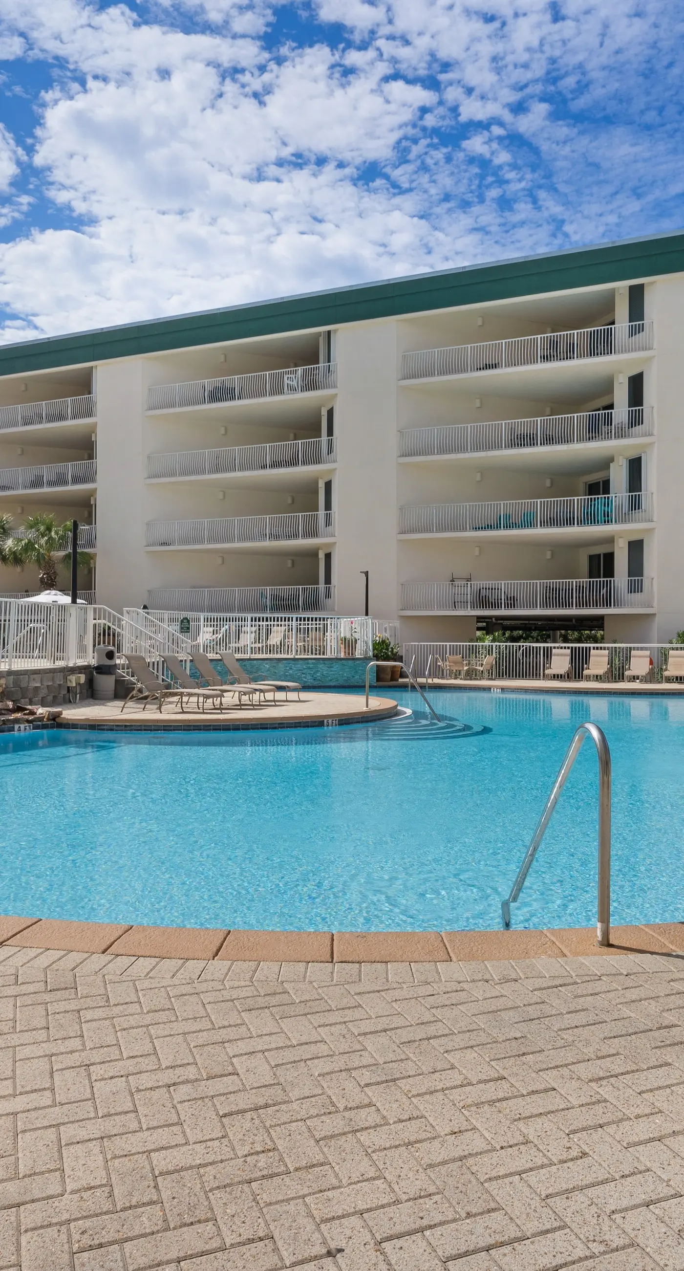 Two-bedroom with bunks, balcony overlooking pool & on-site pickleball