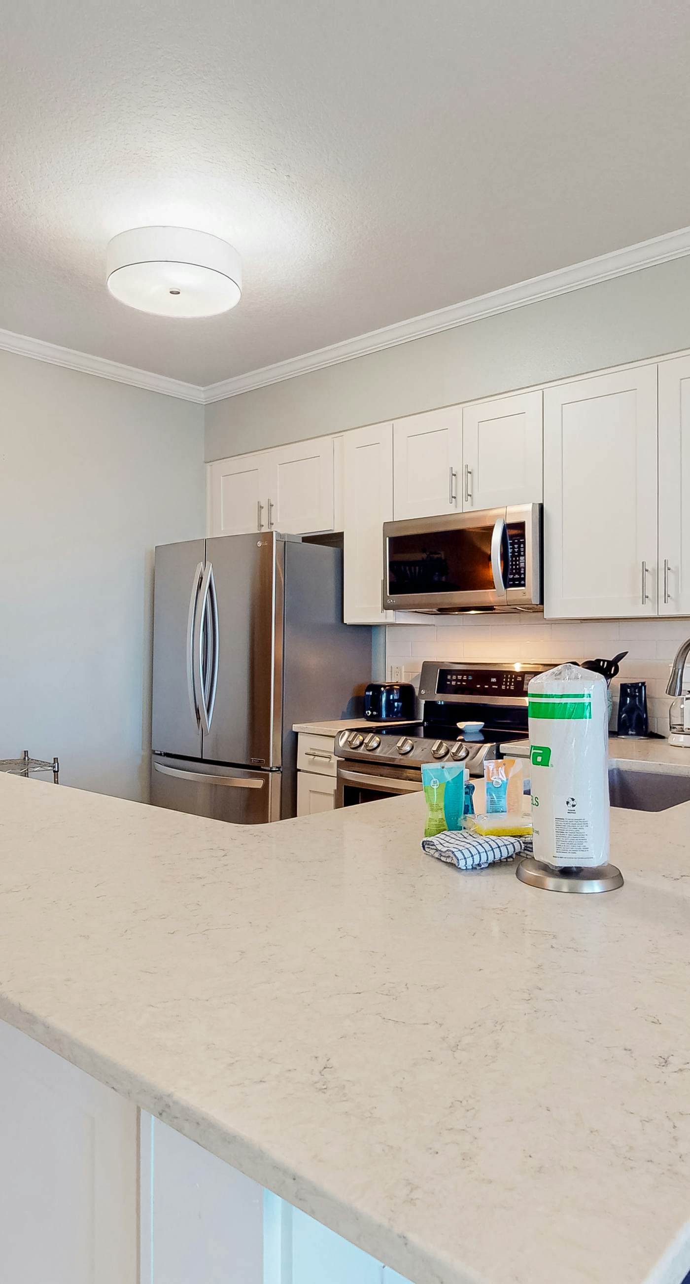 Charming two-bedroom with bunks, balcony overlooking pool & pickleball