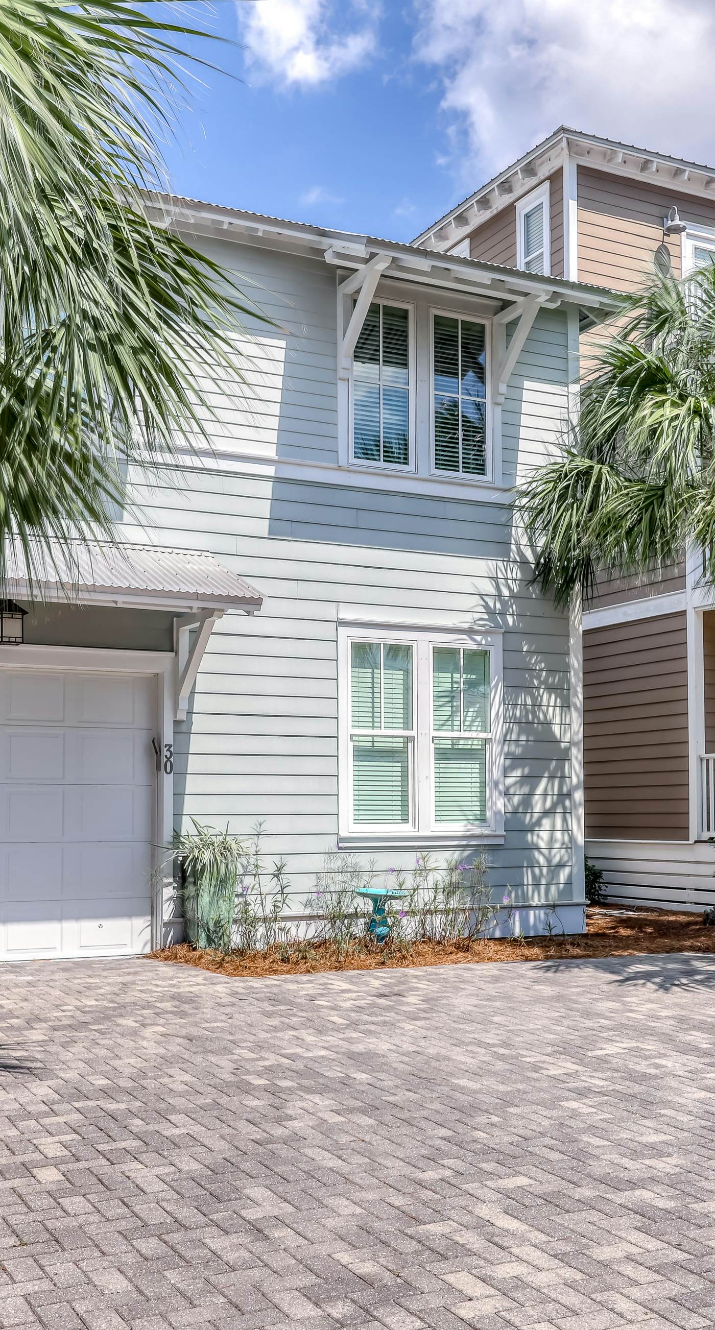 Gorgeous coastal home w/ shared pool - walk to beach, dining & shopping