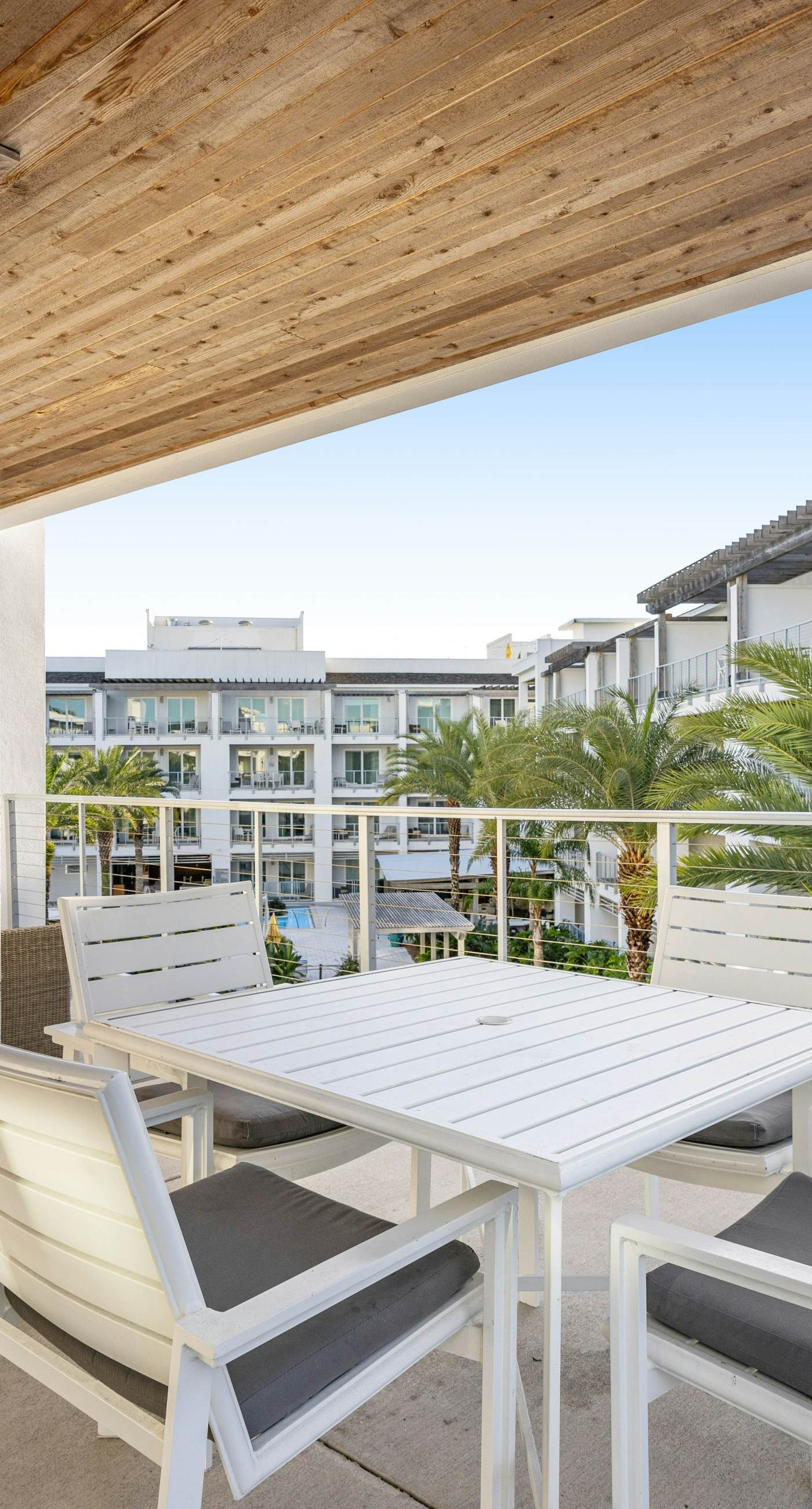Third-floor luxury condo near beach with resort pool, gym & EV chargers