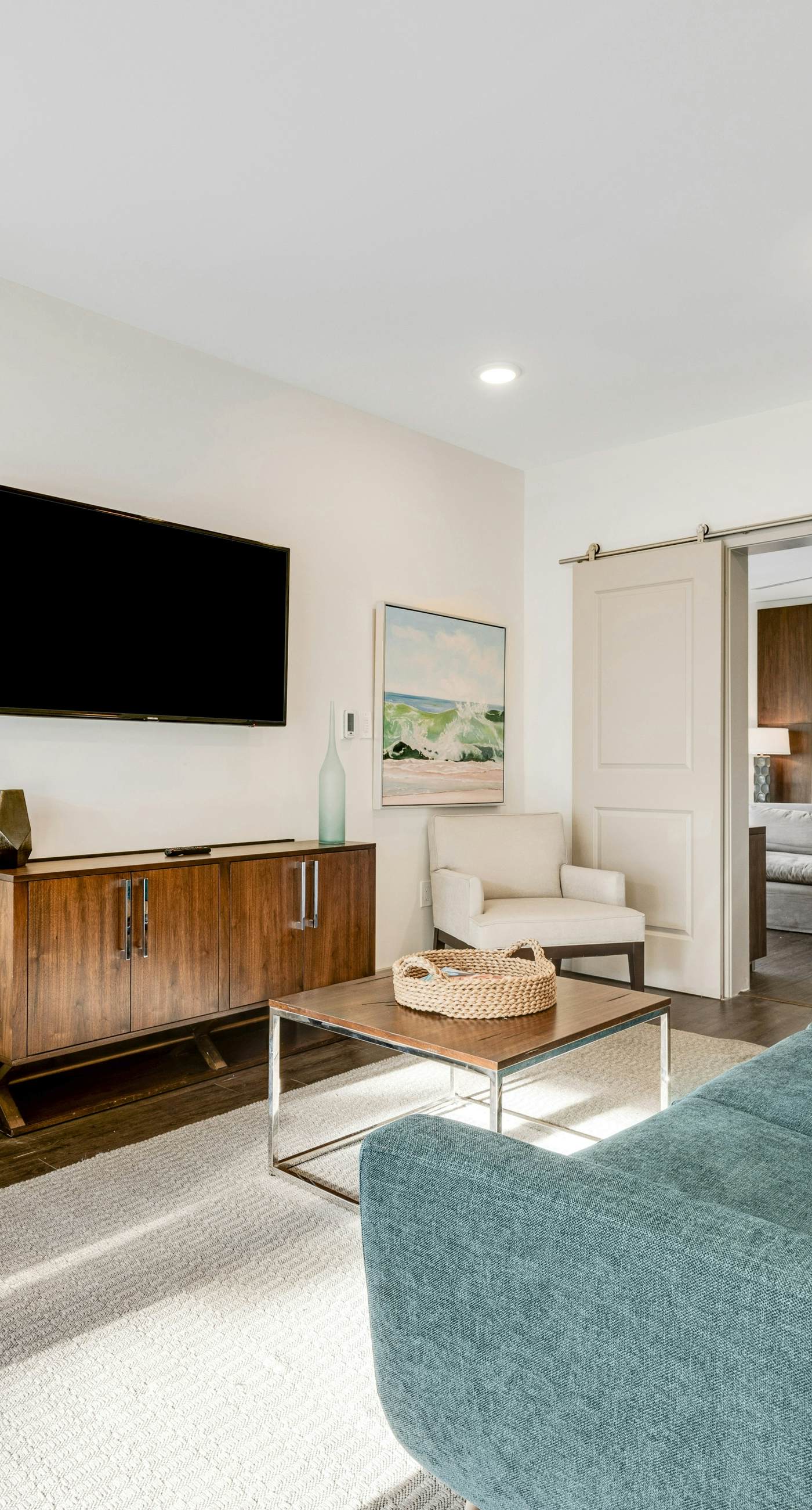 Third-floor luxury condo near beach with resort pool, gym & EV chargers