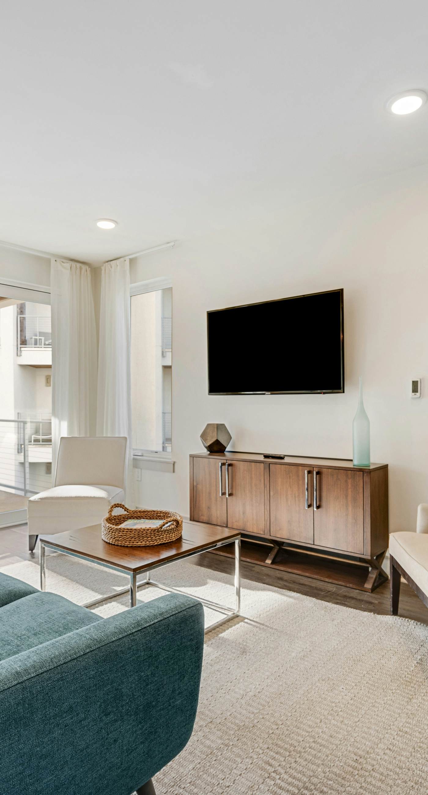 Third-floor luxury condo near beach with resort pool, gym & EV chargers