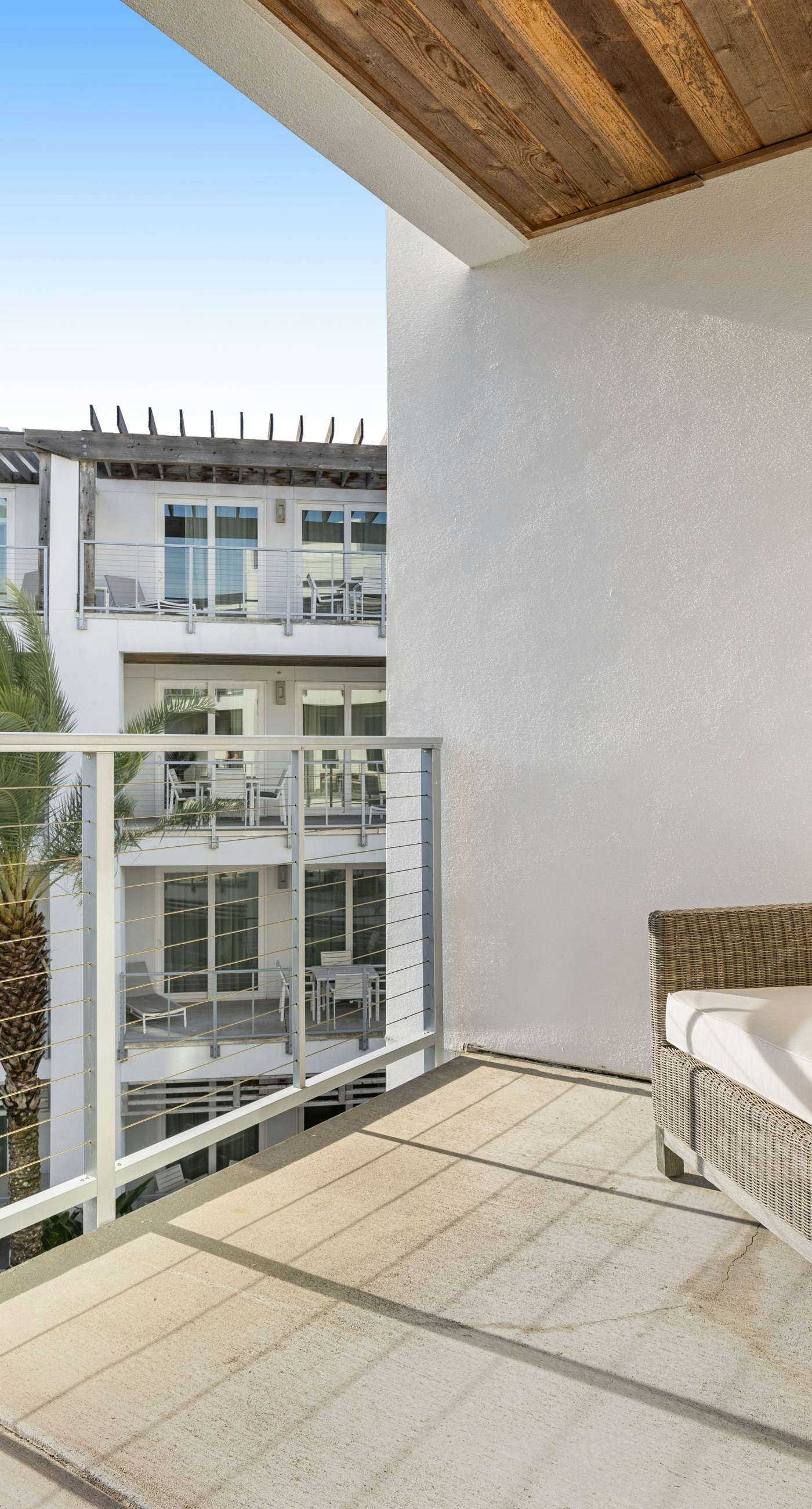 Third-floor luxury condo near beach with resort pool, gym & EV chargers