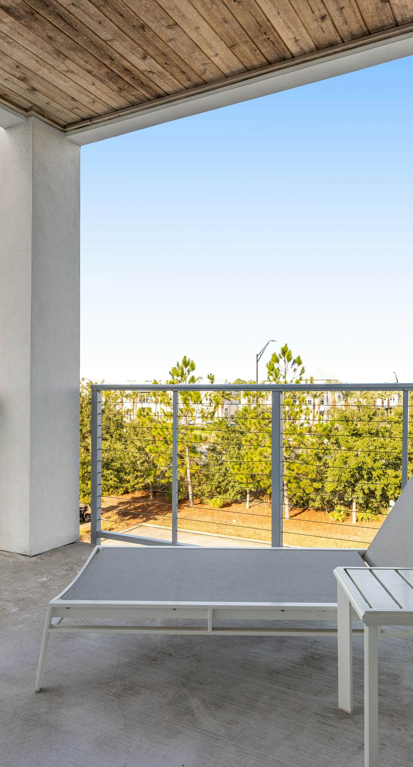 Third-floor luxury condo near beach with resort pool, gym & EV chargers