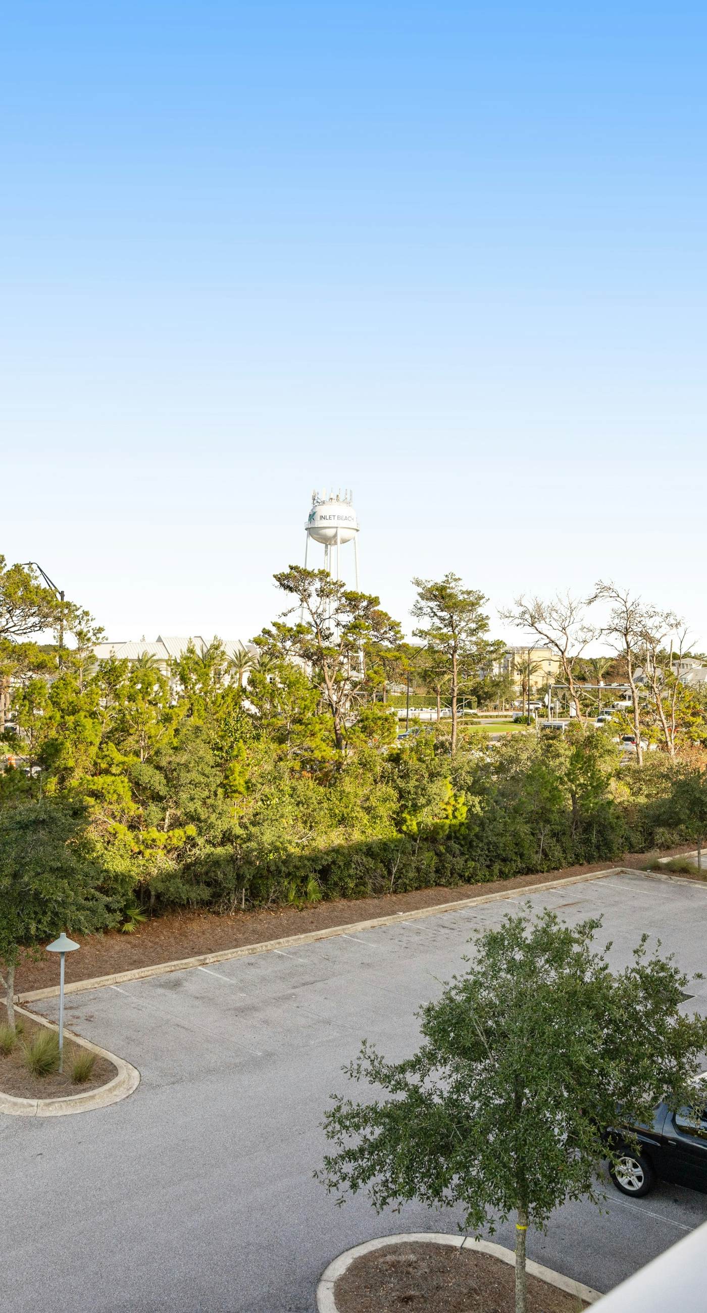 Third-floor luxury condo near beach with resort pool, gym & EV chargers