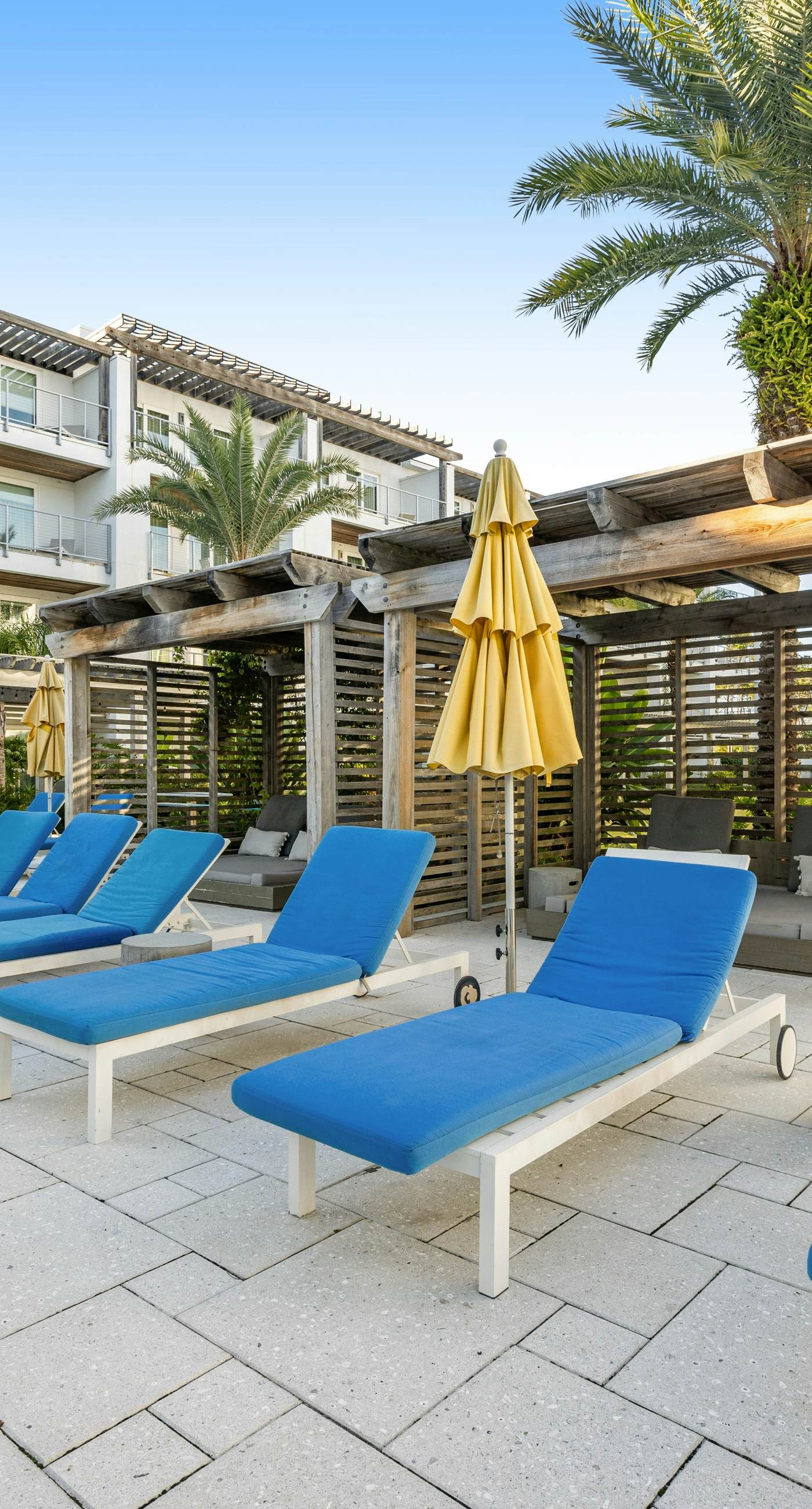 Third-floor luxury condo near beach with resort pool, gym & EV chargers