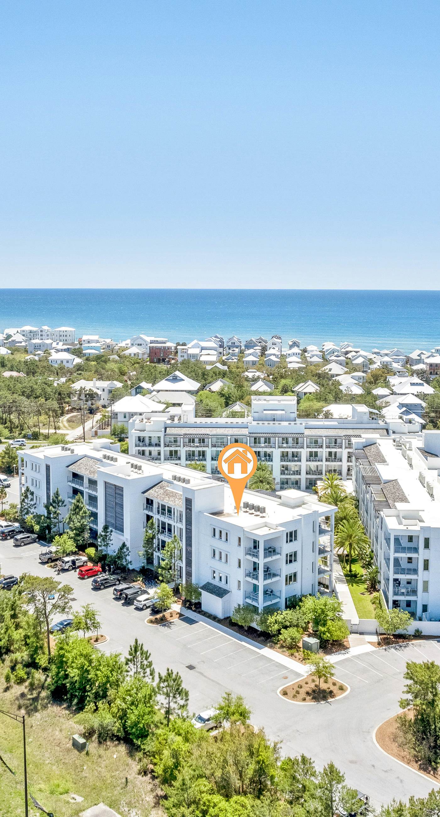 Third-floor luxury condo near beach with resort pool, gym & EV chargers