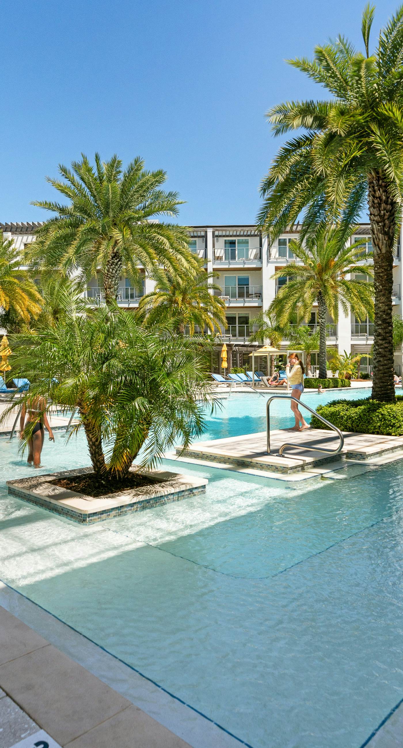 Third-floor luxury condo near beach with resort pool, gym & EV chargers