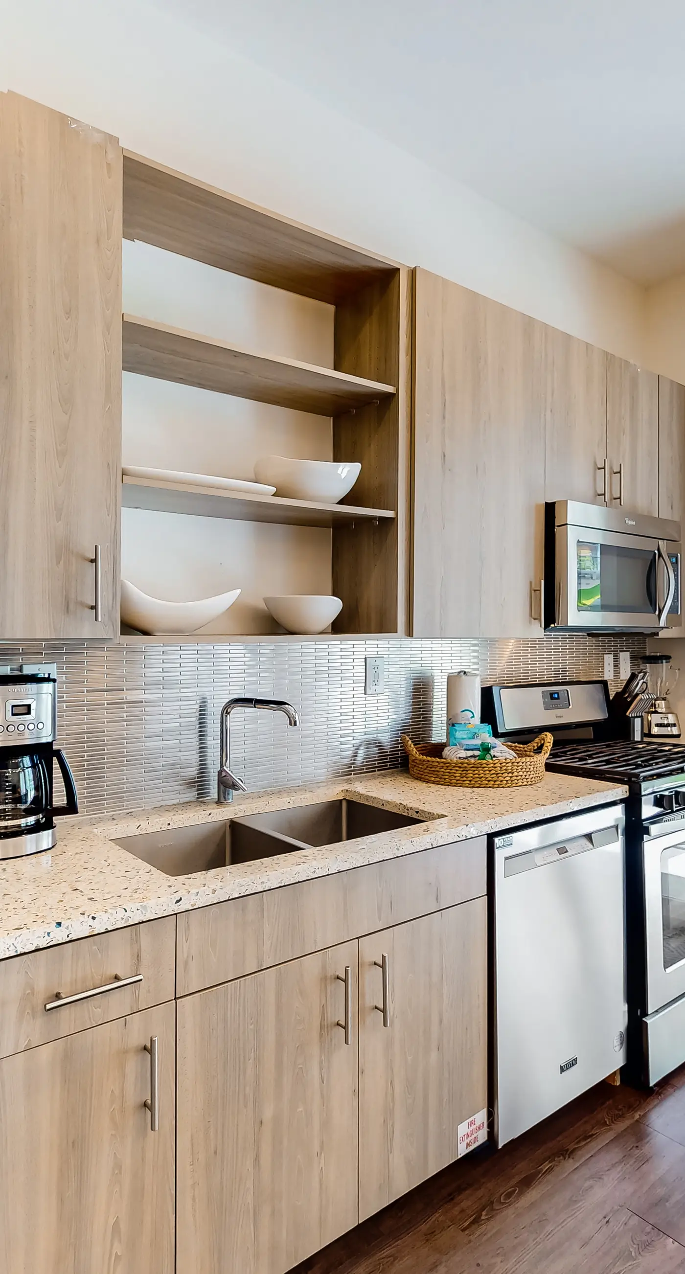 Chic condo steps from beach with patio, W/D, AC, and resort-style pool and gym