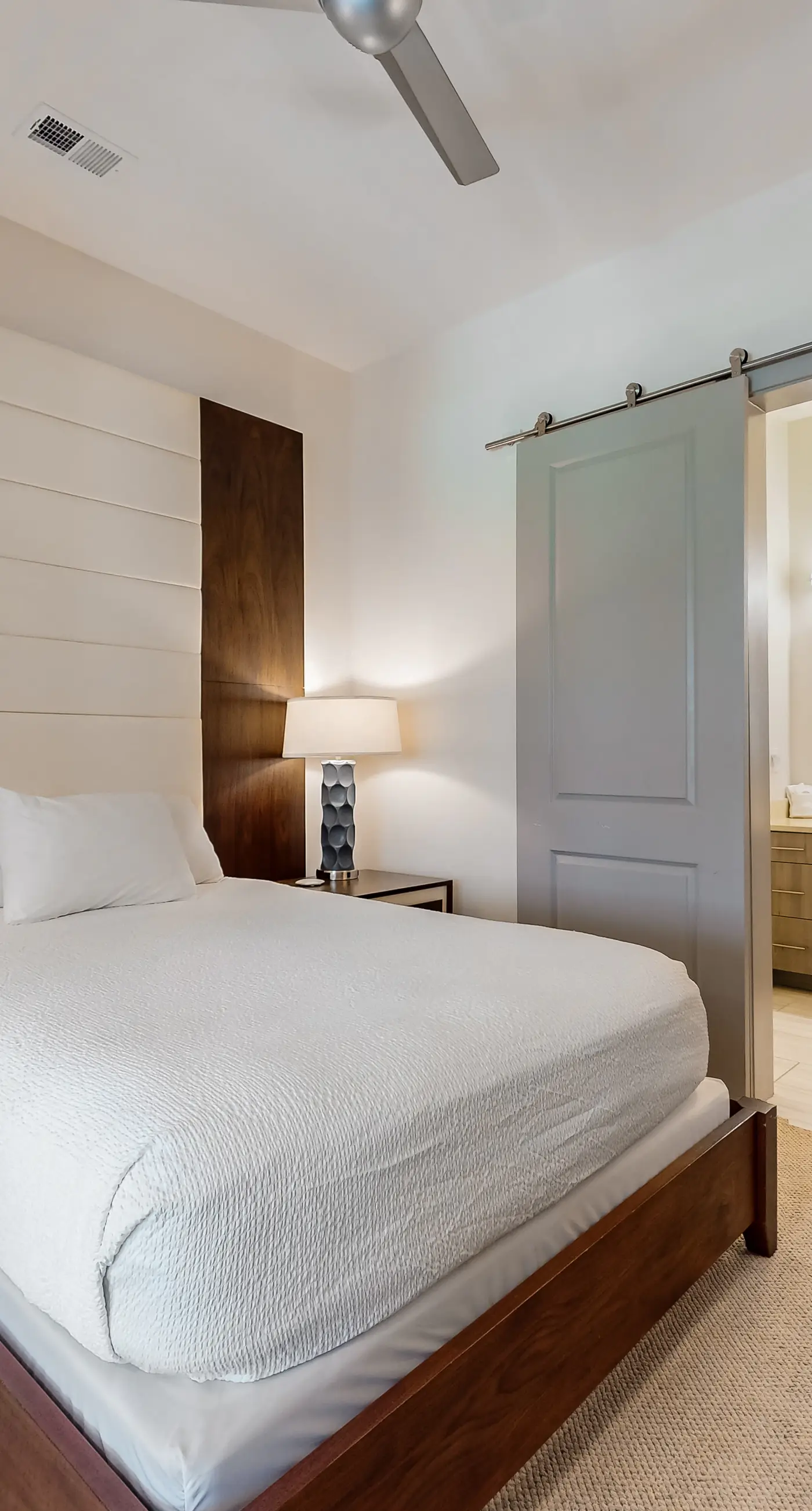 Chic condo steps from beach with patio, W/D, AC, and resort-style pool and gym