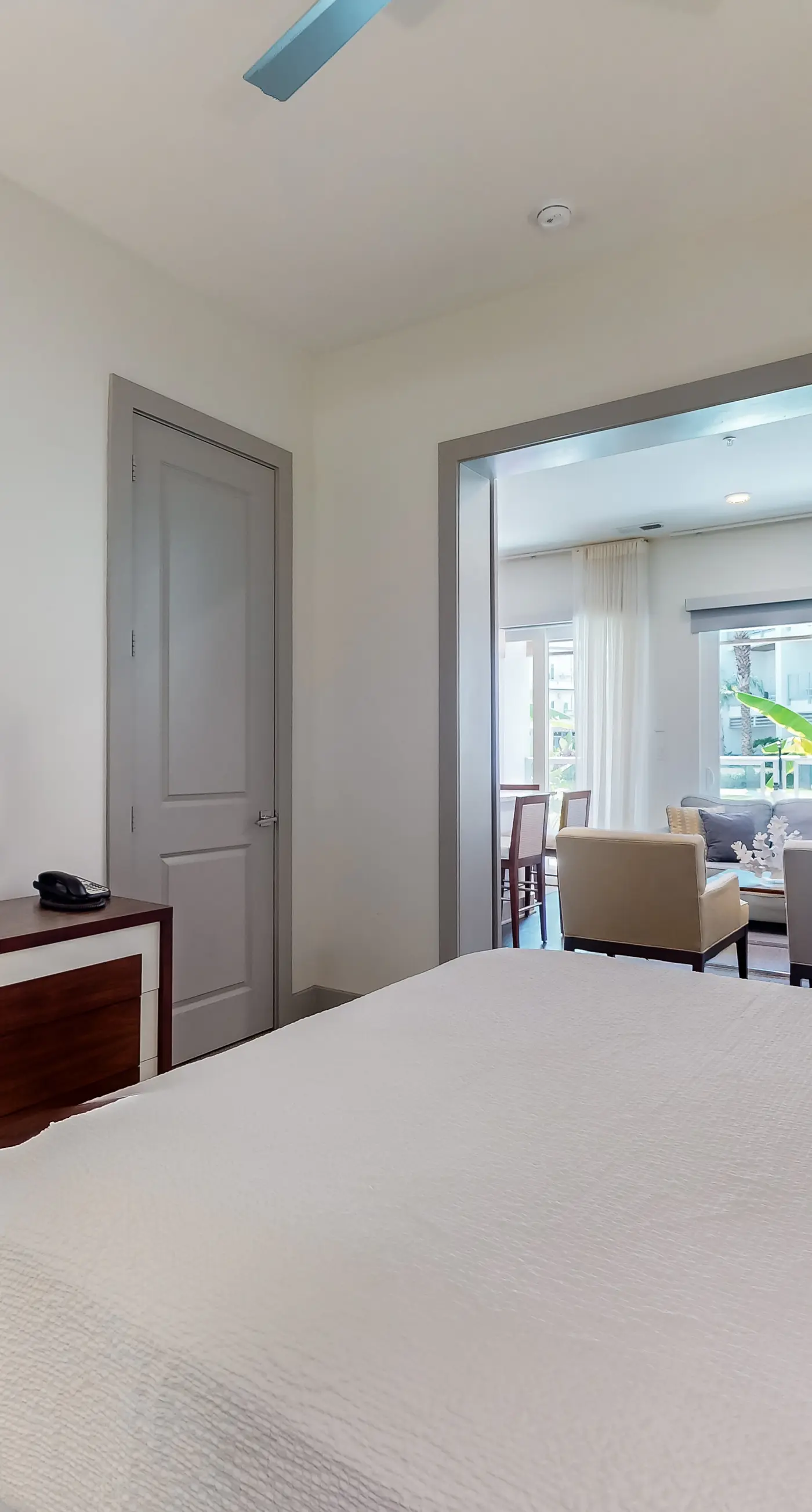 Chic condo steps from beach with patio, W/D, AC, and resort-style pool and gym