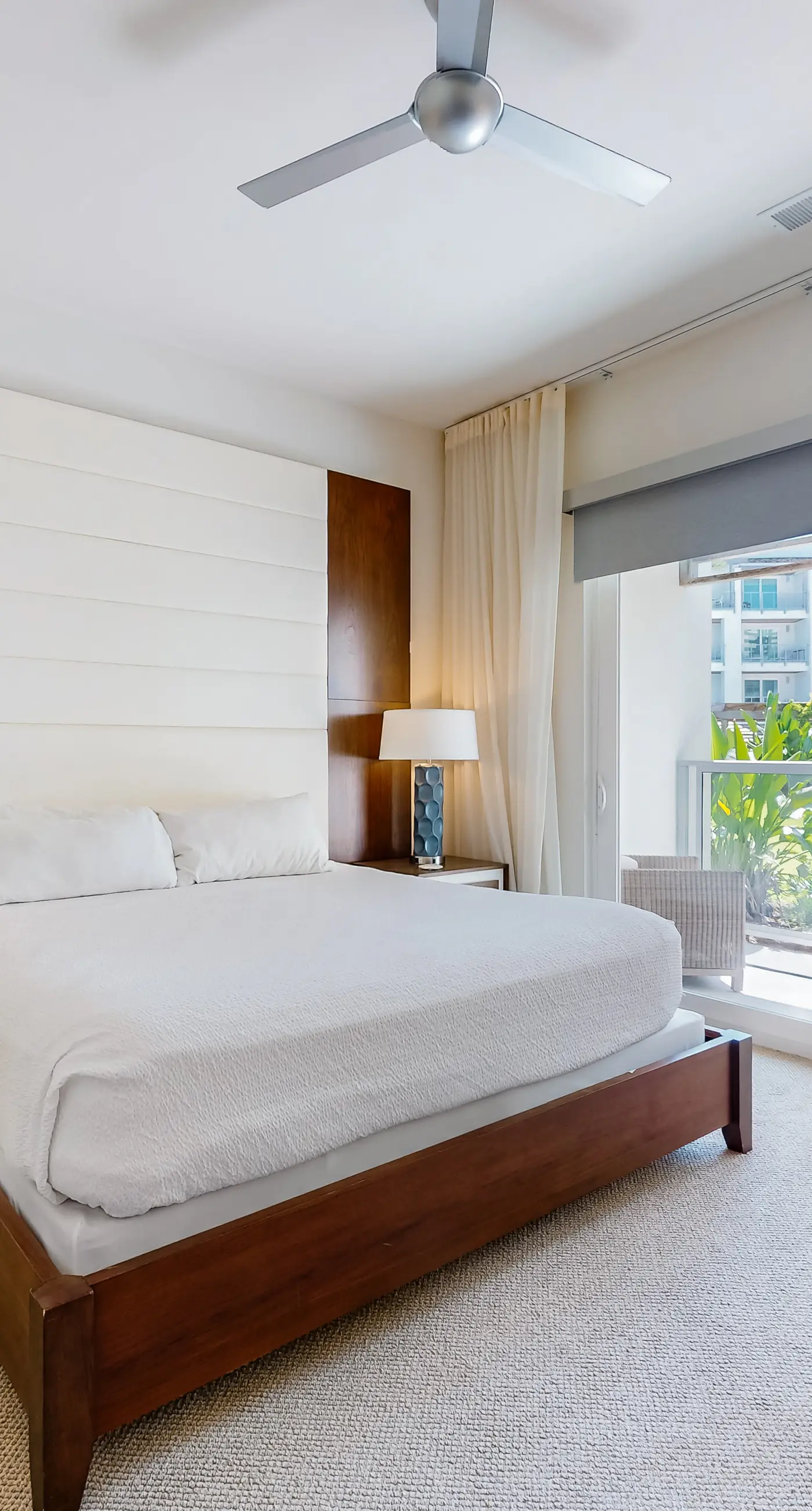 Chic condo steps from beach with patio, W/D, AC, and resort-style pool and gym