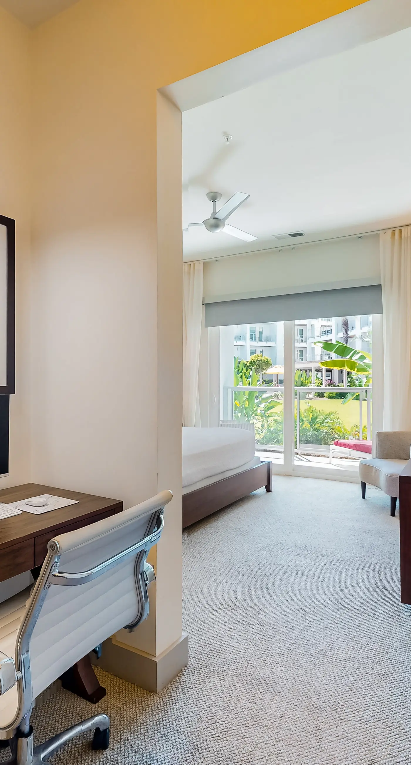 Chic condo steps from beach with patio, W/D, AC, and resort-style pool and gym