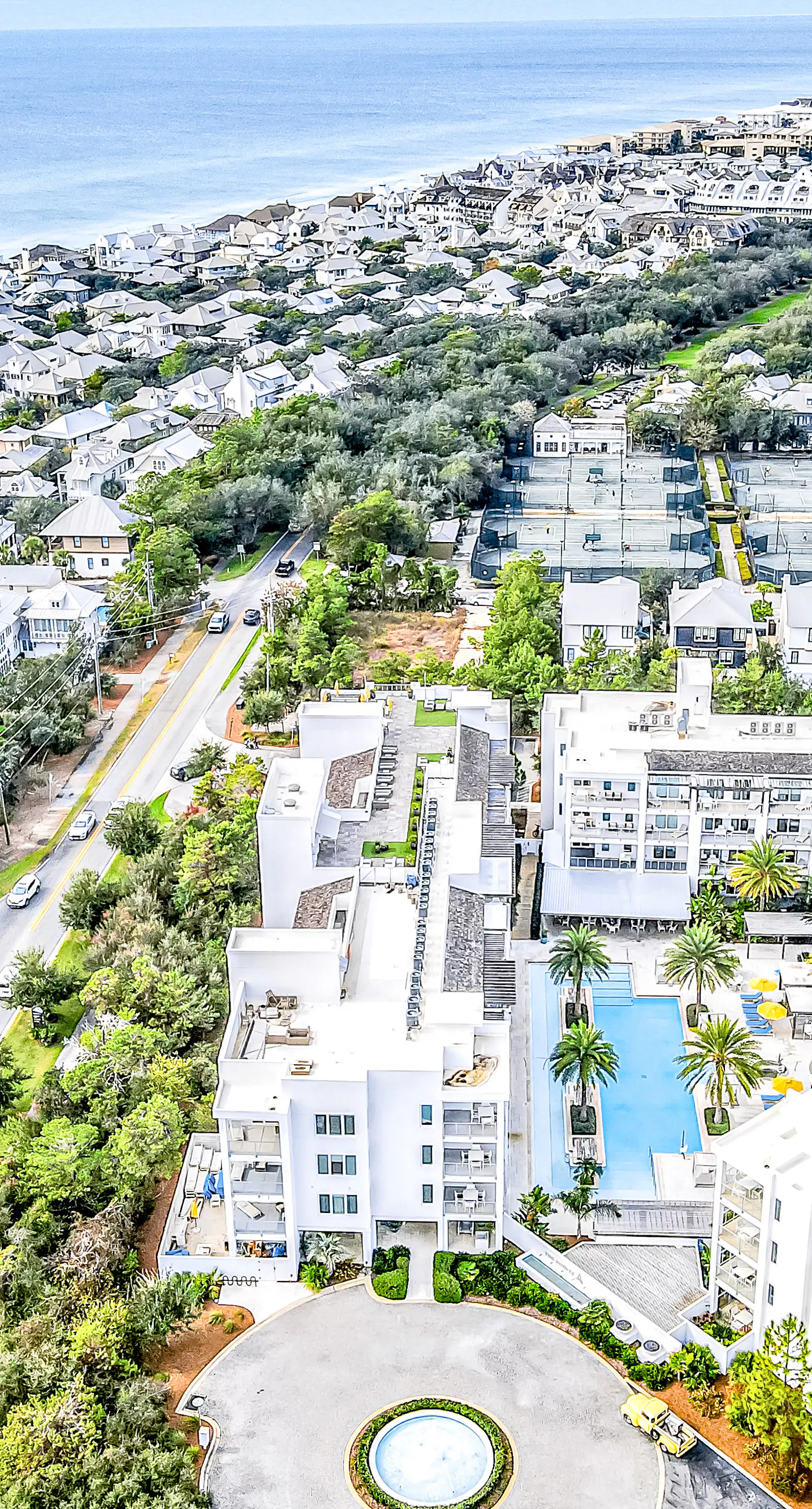 Chic condo steps from beach with patio, W/D, AC, and resort-style pool and gym