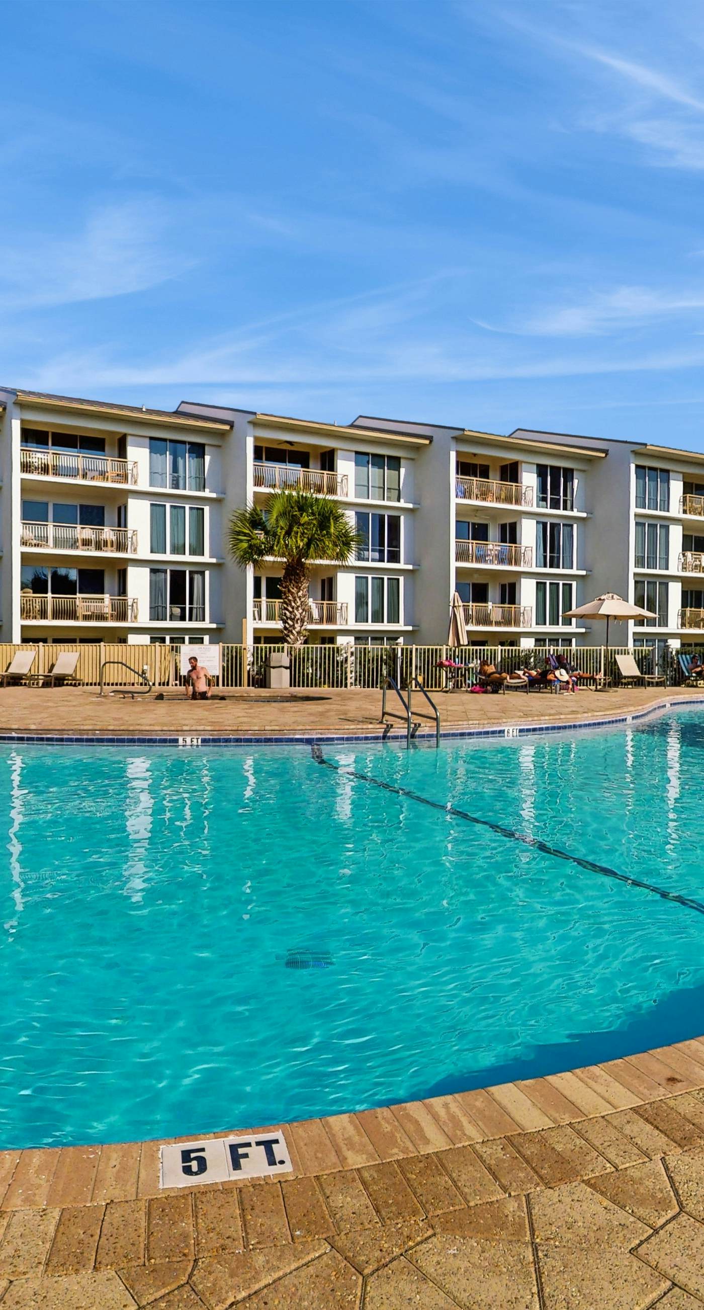 Gorgeous condo with lagoon pool, hot tub, beach access & pickleball court!