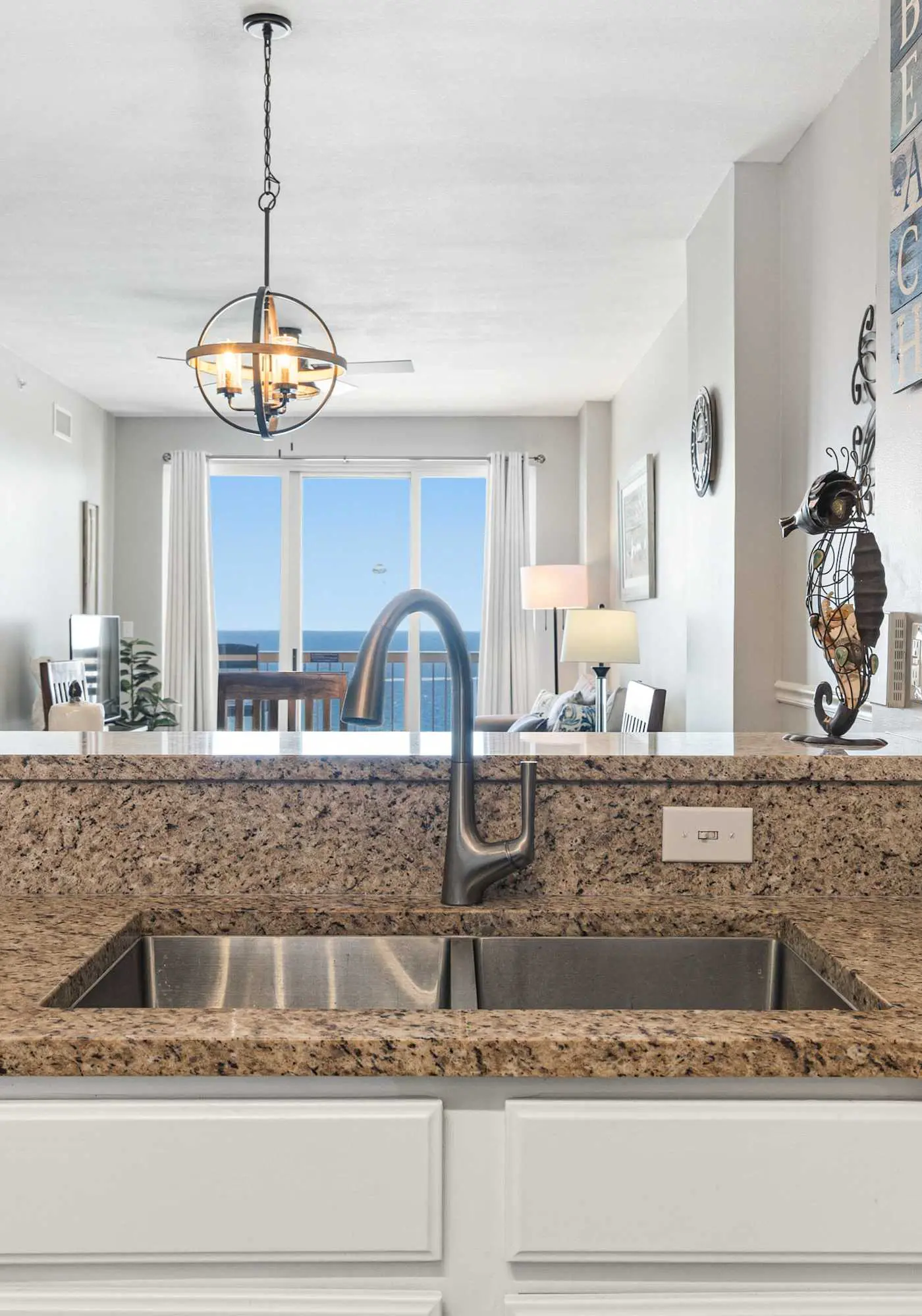 Welcoming waterfront condo with a furnished balcony, pool & pool spa