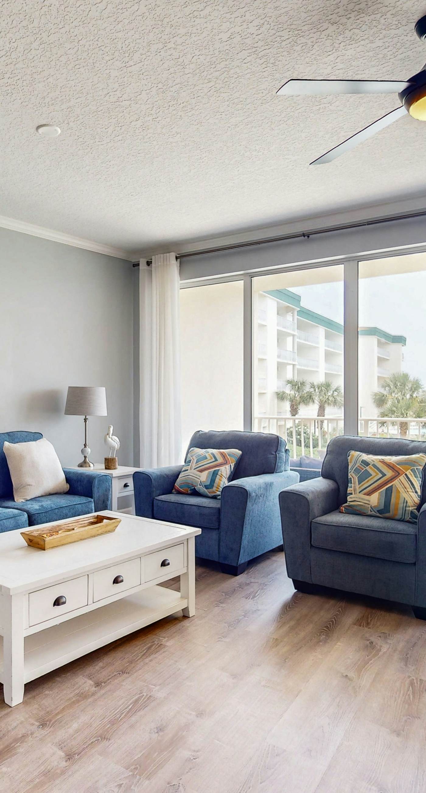 Attractive home with spacious balcony, pool view & pickleball - near beach