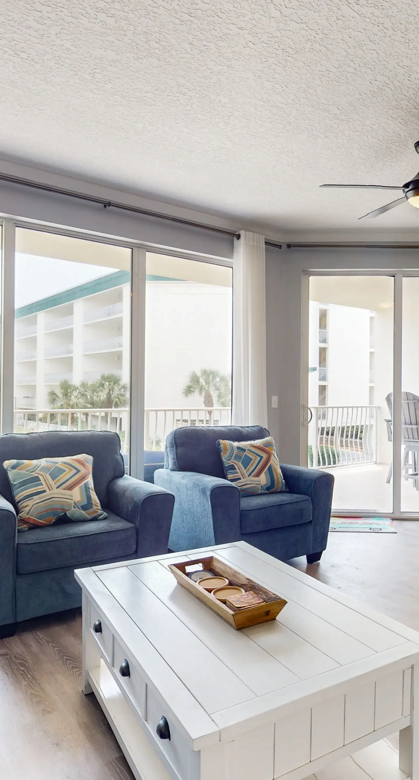 Attractive home with spacious balcony, pool view & pickleball - near beach