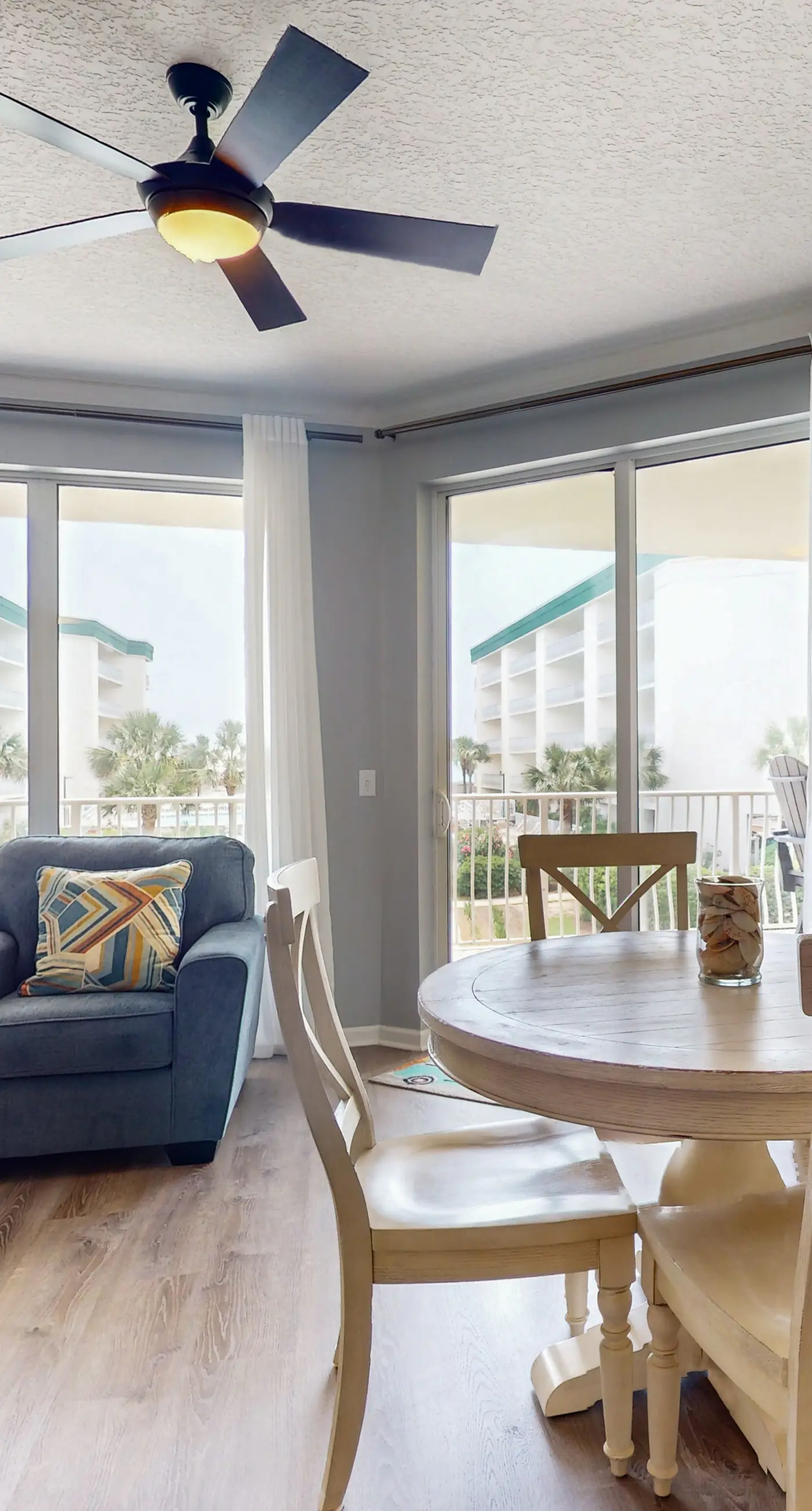 Attractive home with spacious balcony, pool view & pickleball - near beach