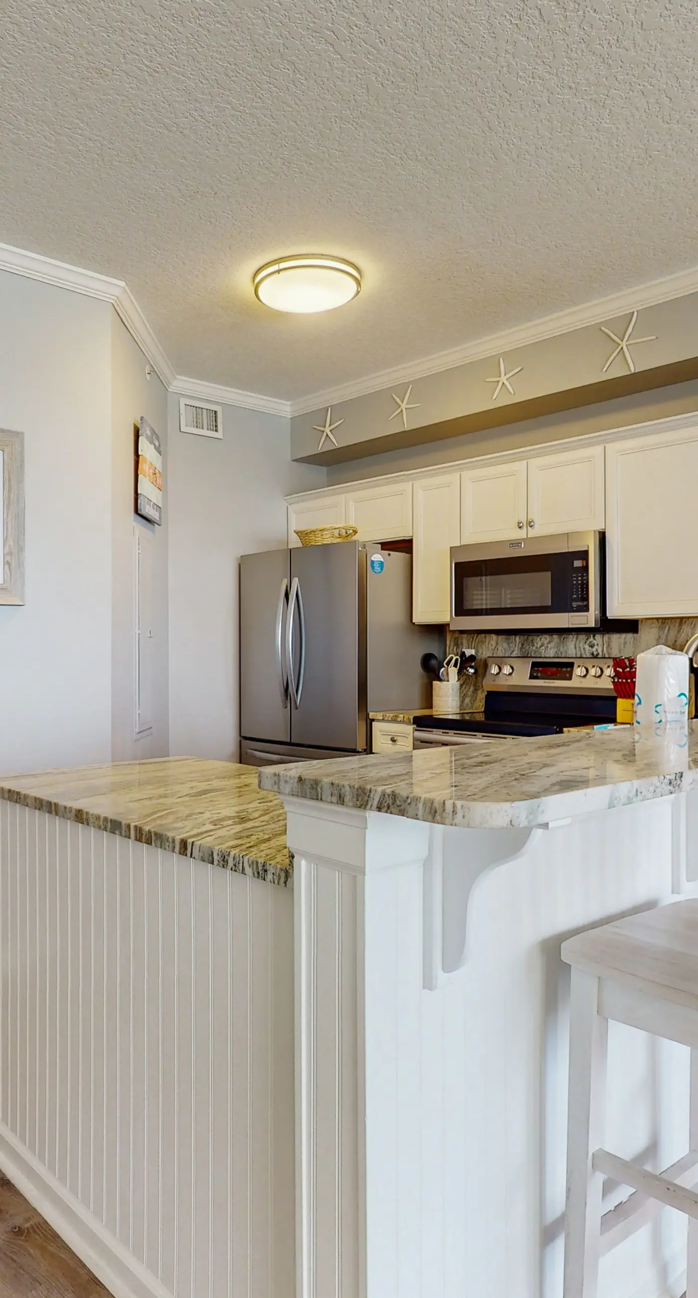 Attractive home with spacious balcony, pool view & pickleball - near beach