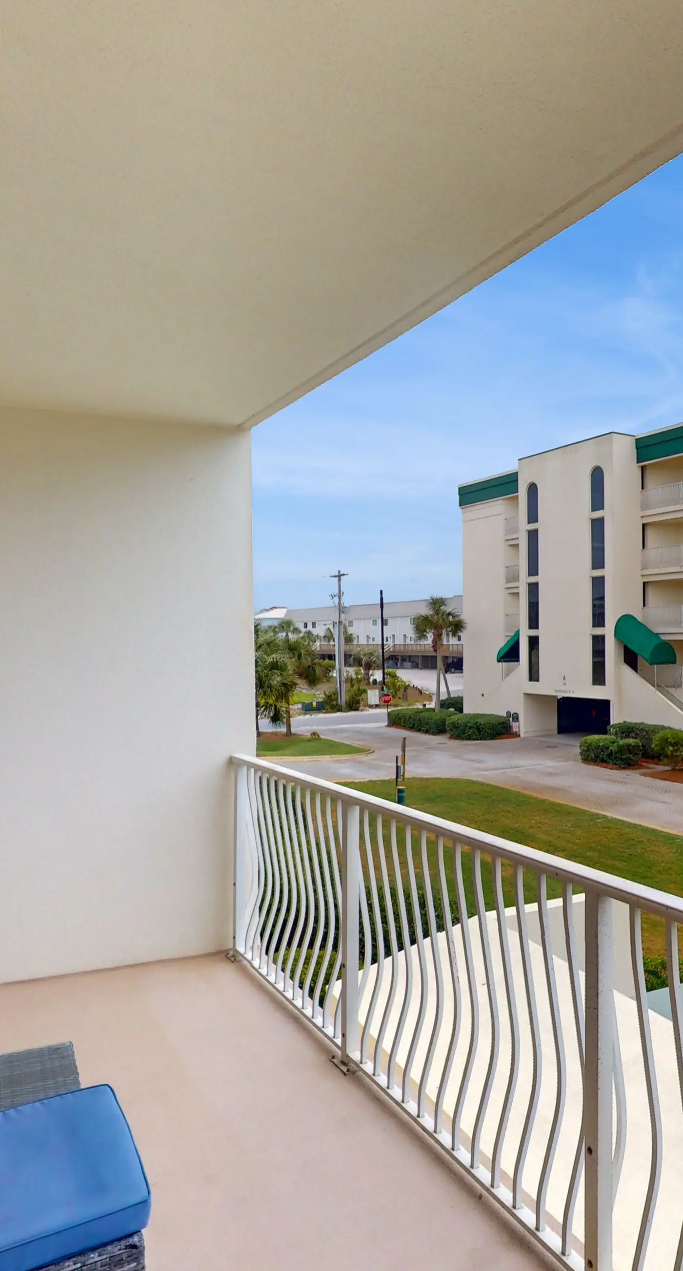 Attractive home with spacious balcony, pool view & pickleball - near beach