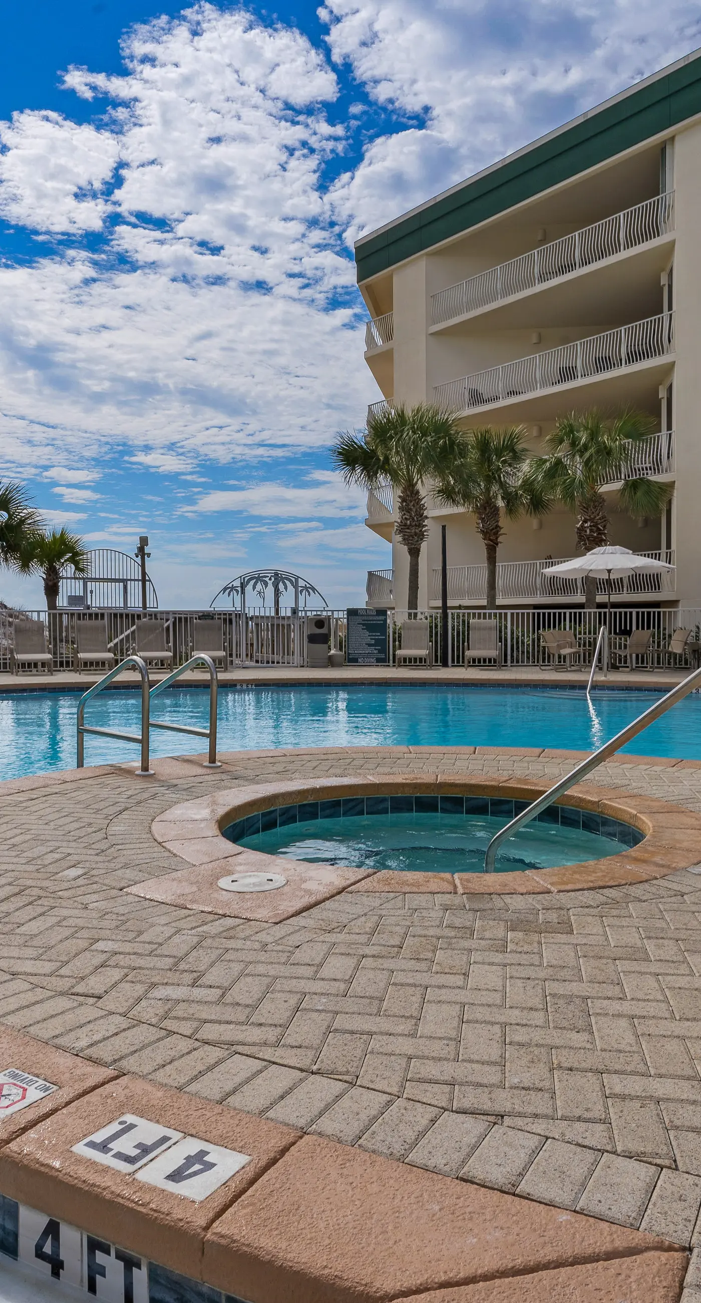Attractive home with spacious balcony, pool view & pickleball - near beach