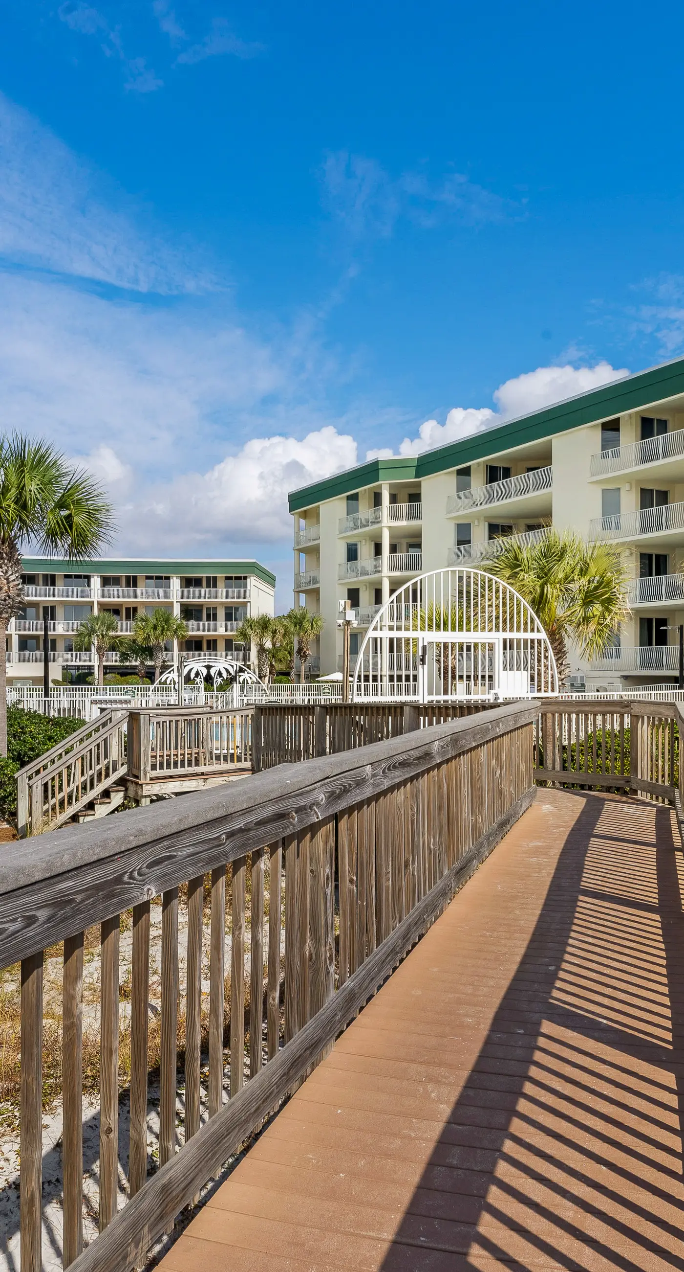 Attractive home with spacious balcony, pool view & pickleball - near beach