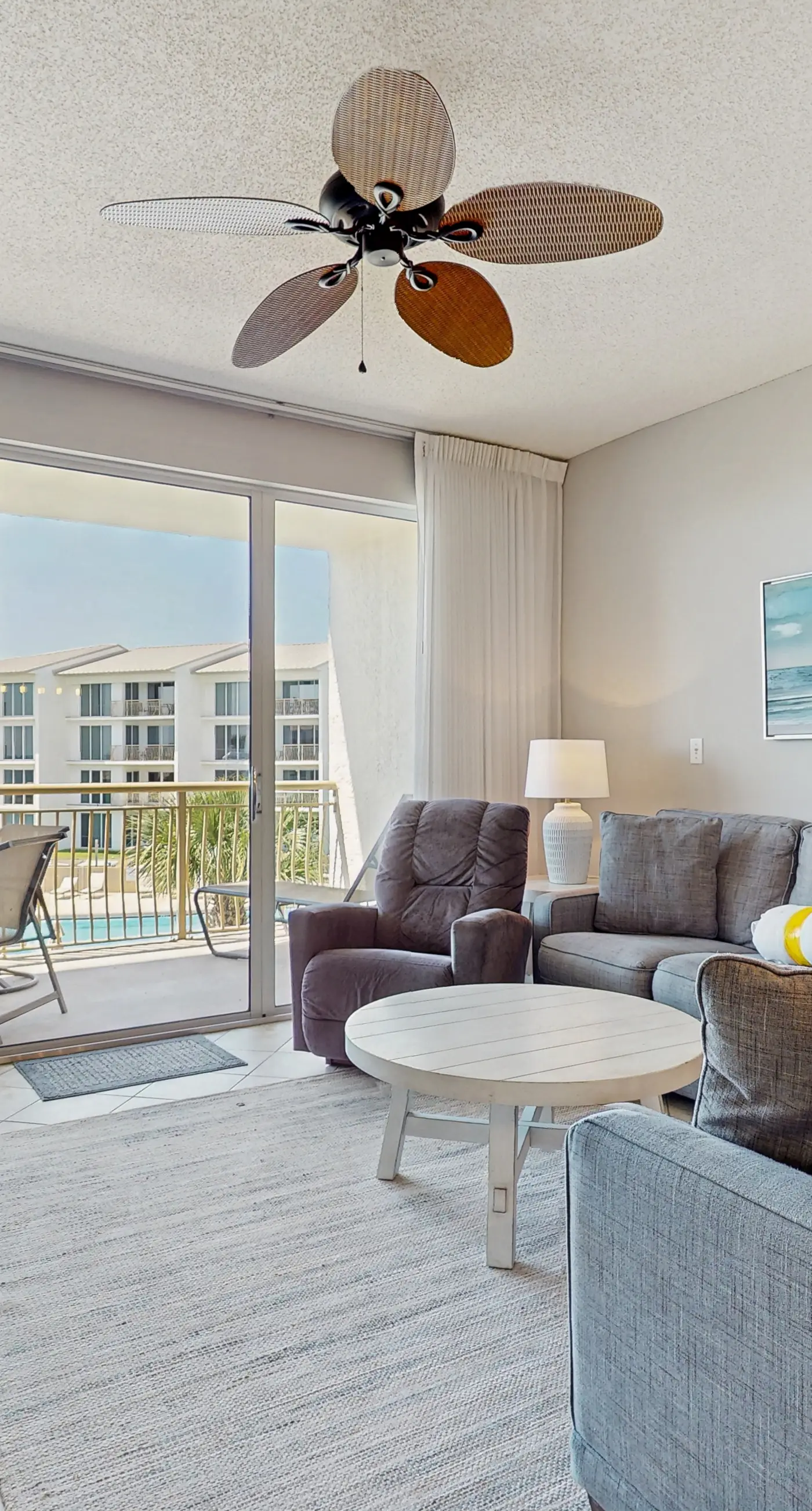 Airy beachfront condo with balcony views, lagoon pool, tennis & pickleball