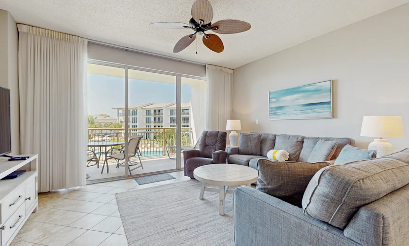 Airy beachfront condo with balcony views, lagoon pool, tennis & pickleball