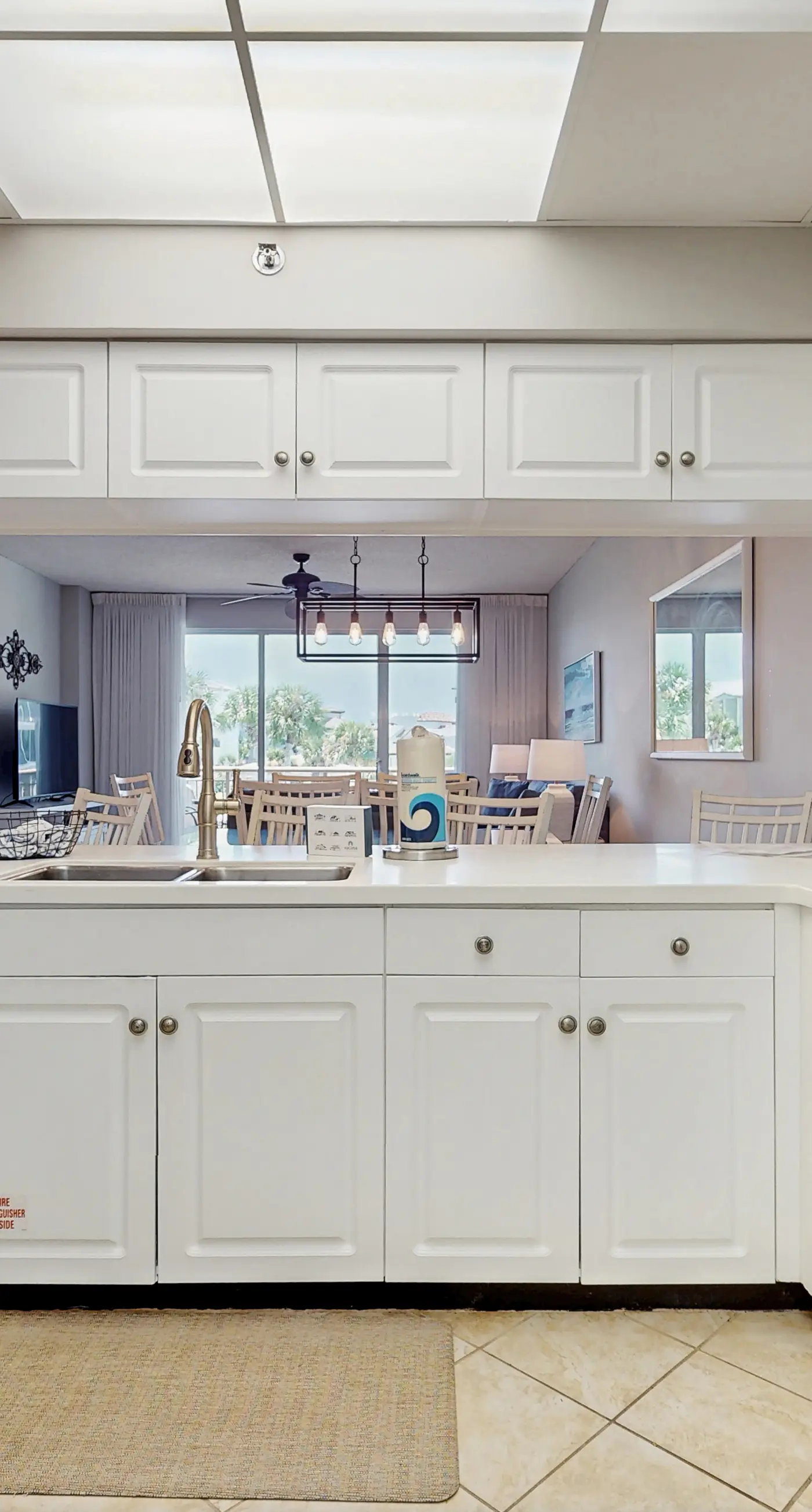 Airy beachfront condo with balcony views, lagoon pool, tennis & pickleball