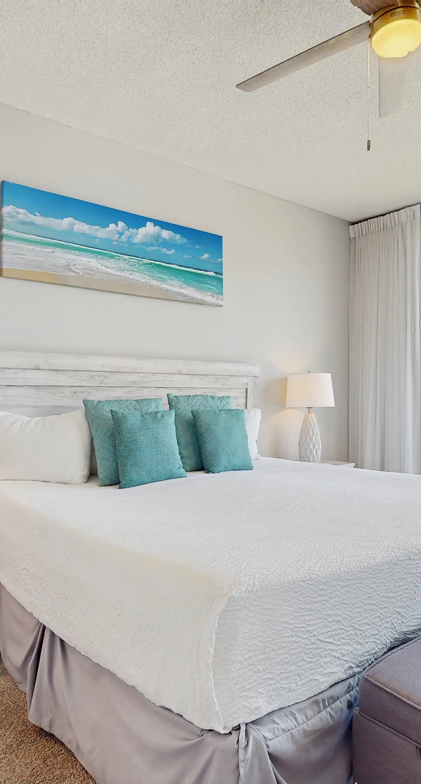 Airy beachfront condo with balcony views, lagoon pool, tennis & pickleball