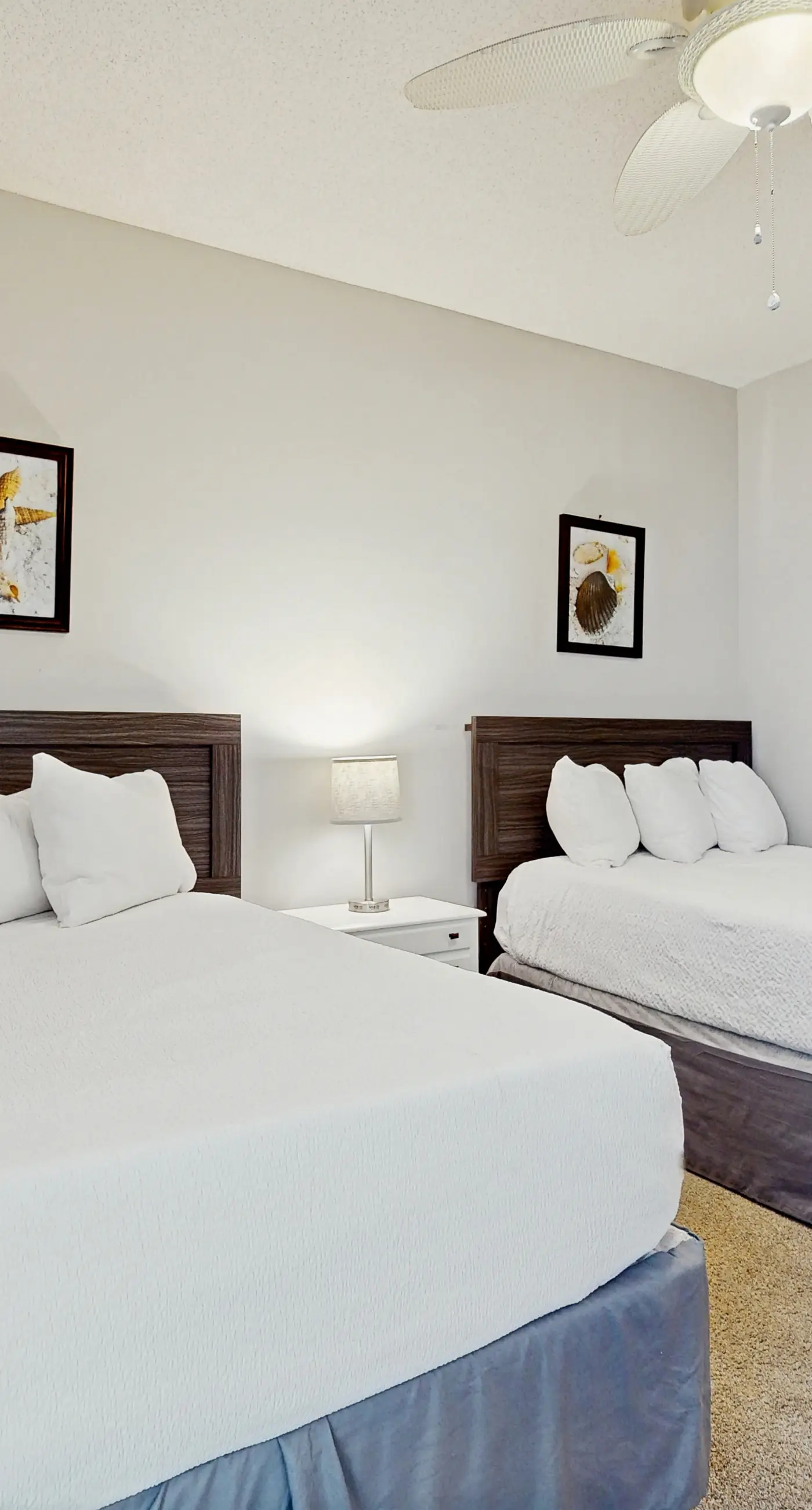 Airy beachfront condo with balcony views, lagoon pool, tennis & pickleball