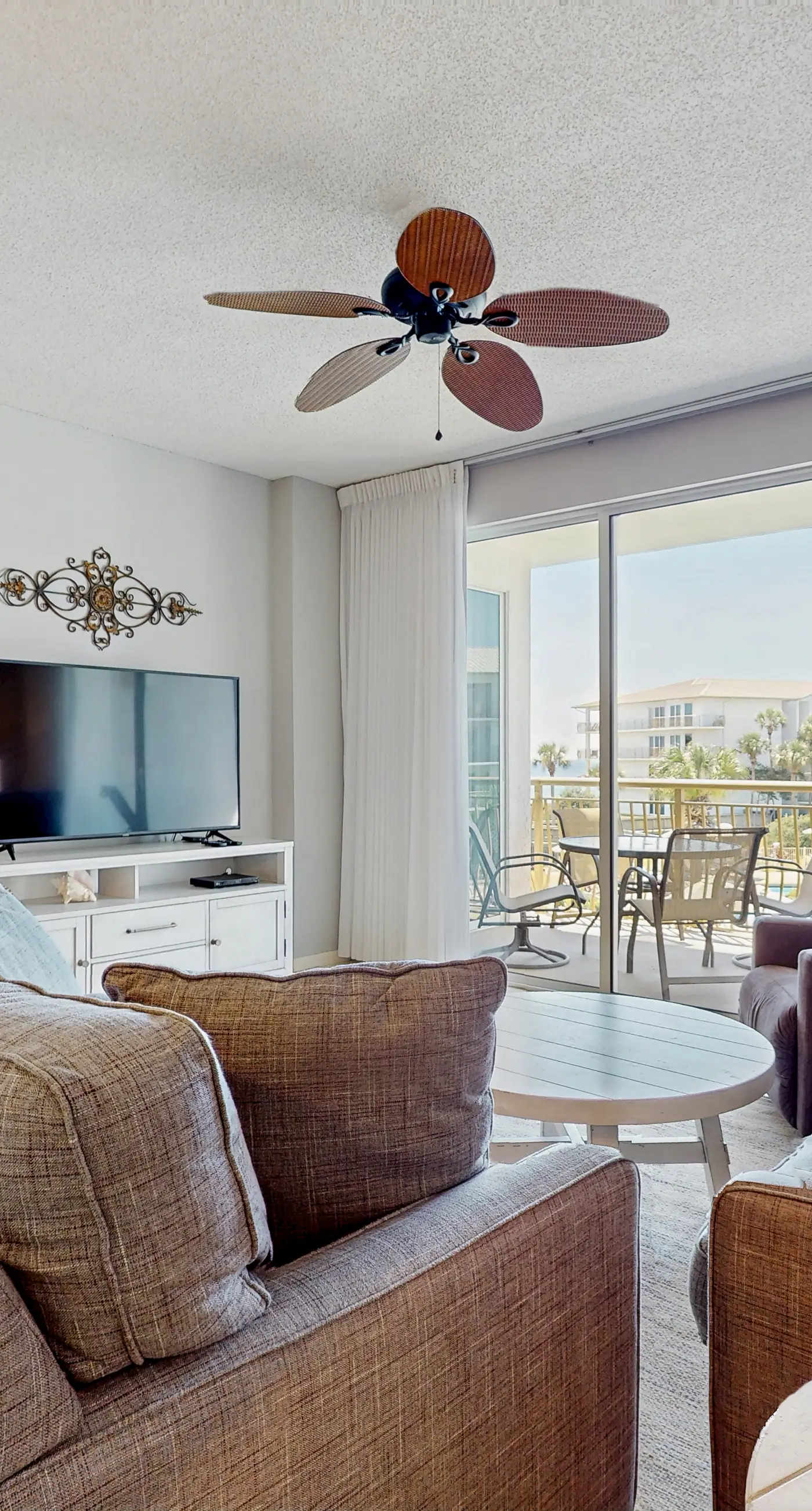 Airy beachfront condo with balcony views, lagoon pool, tennis & pickleball