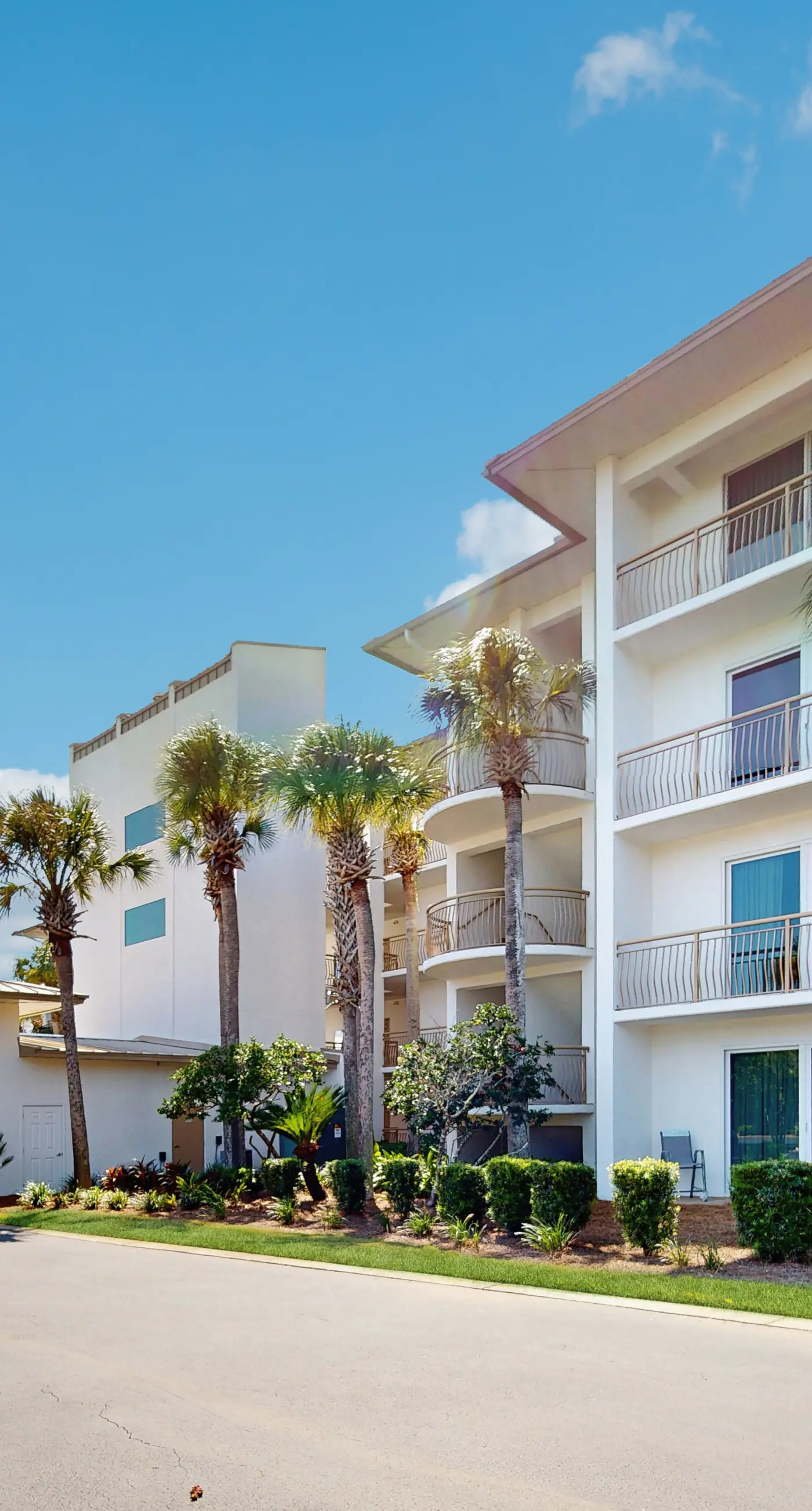Airy beachfront condo with balcony views, lagoon pool, tennis & pickleball