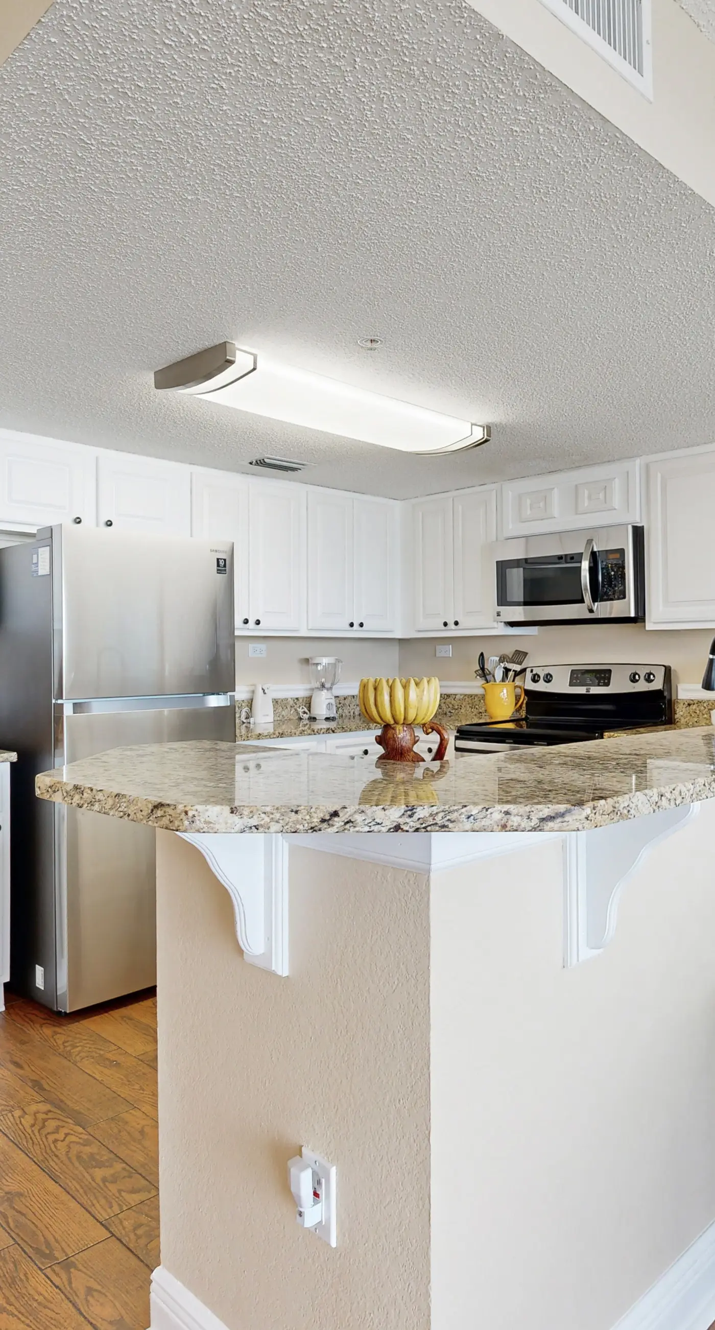 Third floor oceanfront condo with ocean view, pool access, and central AC