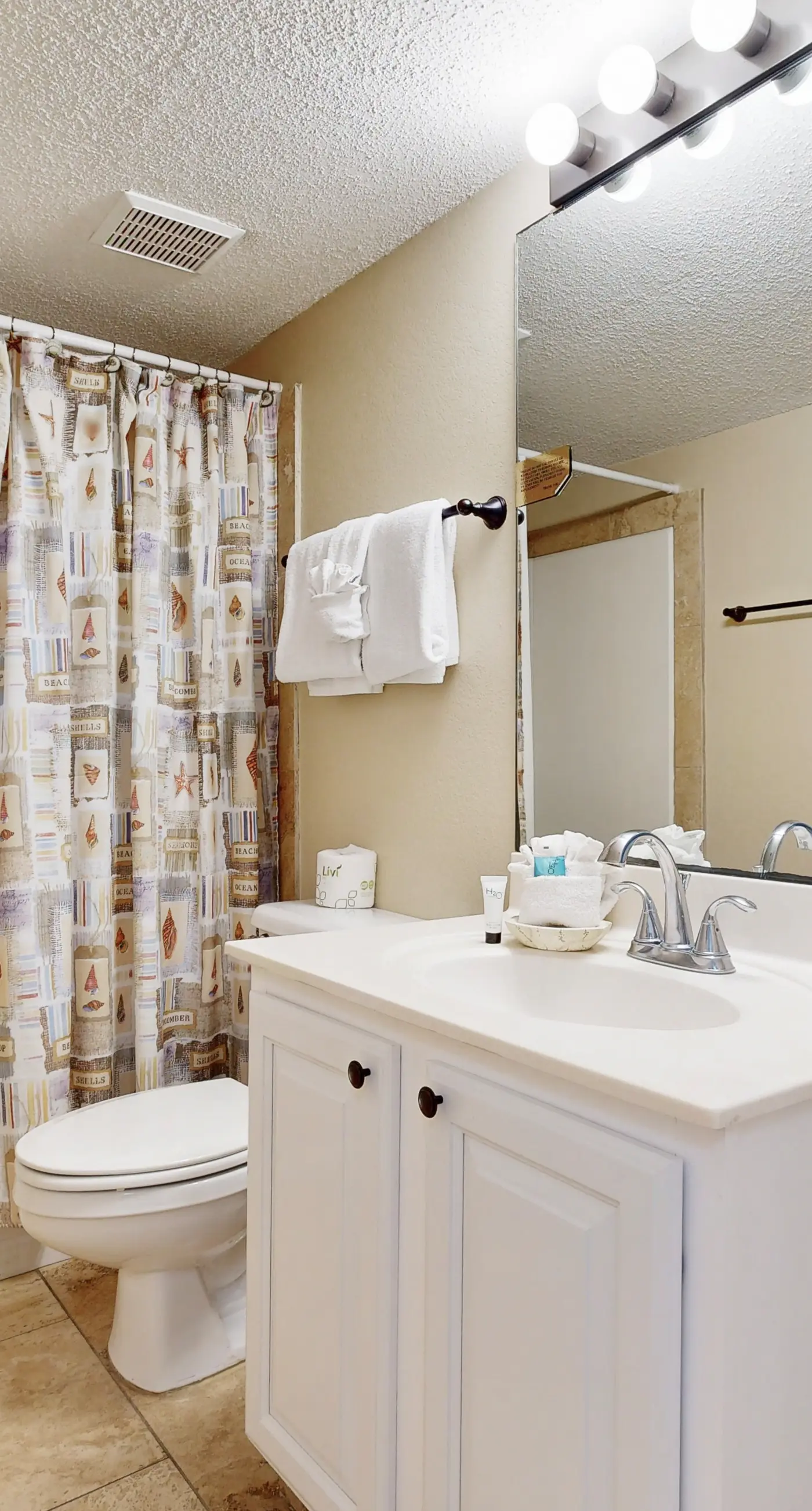 Third floor oceanfront condo with ocean view, pool access, and central AC