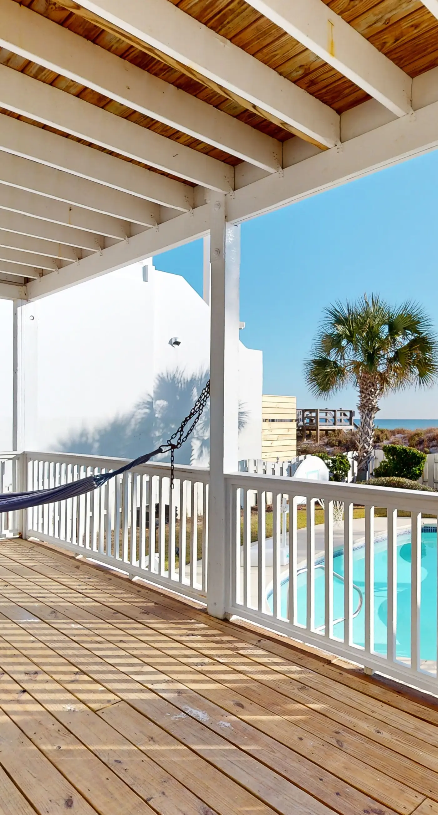 Gulf-front house near golf with pool, ocean views, beach access, & balcony