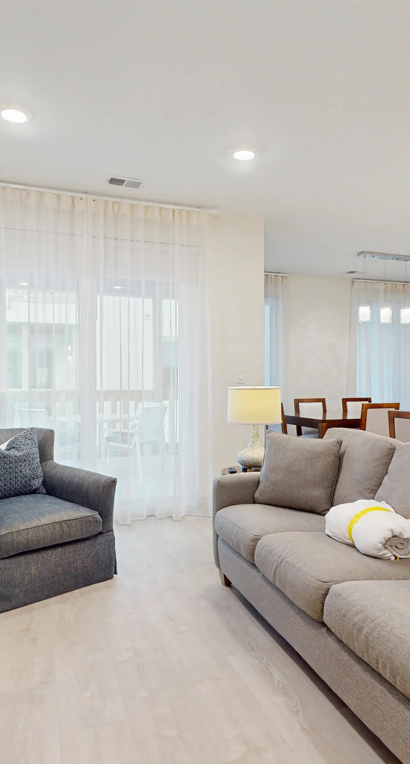 Modern condo with pool, hot tub, gym, wrap-around balcony, & AC