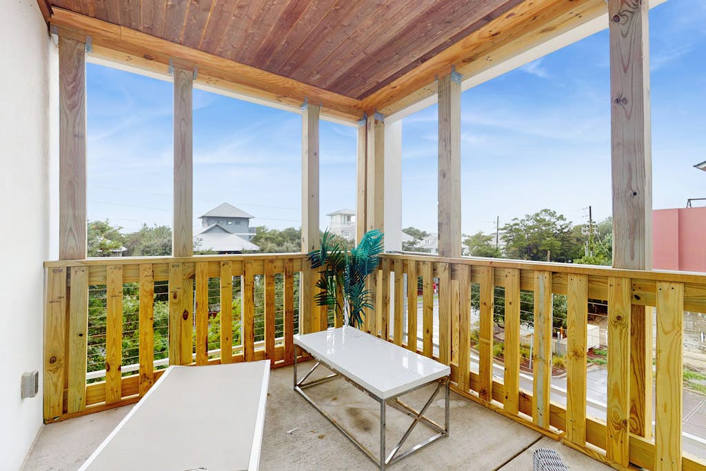 Modern condo with pool, hot tub, gym, wrap-around balcony, & AC