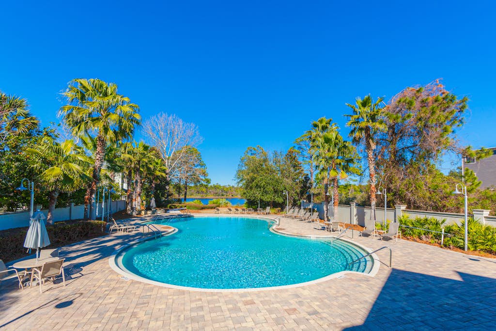 Coastal home with WiFi, central AC, decks, grill, firepit, pool, and dock