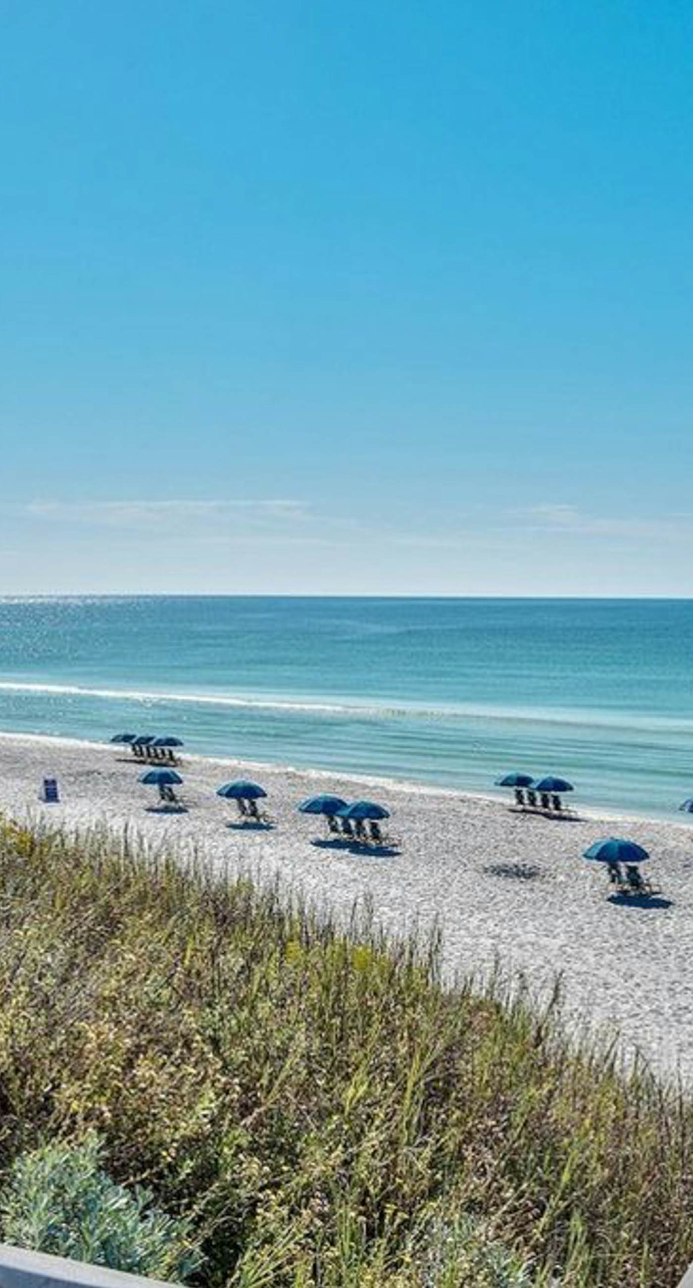 Gorgeous, private, coastal home with a shared pool, fitness room