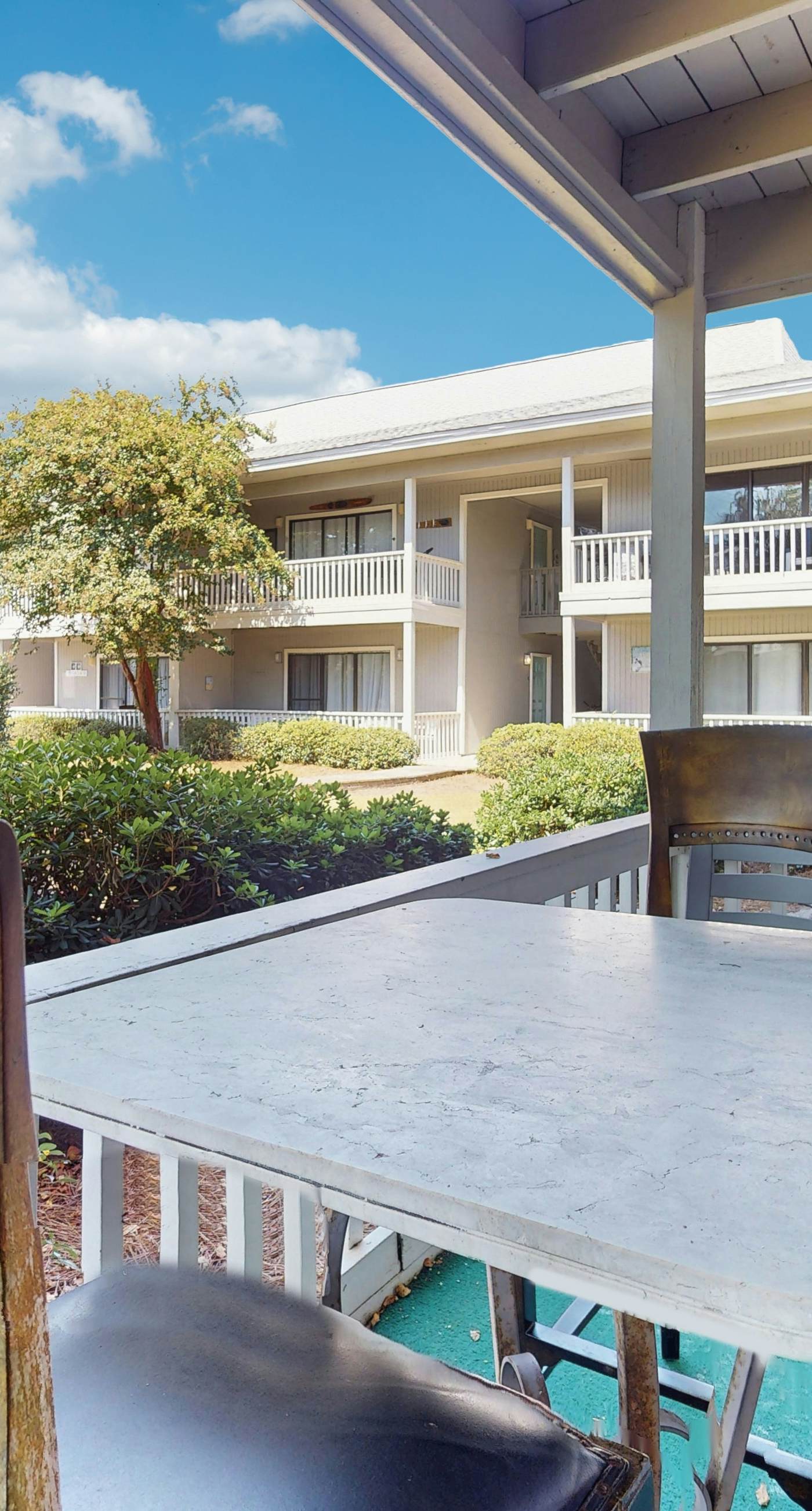 Cute ground floor condo with shared pool, access to shuffleboard and tennis