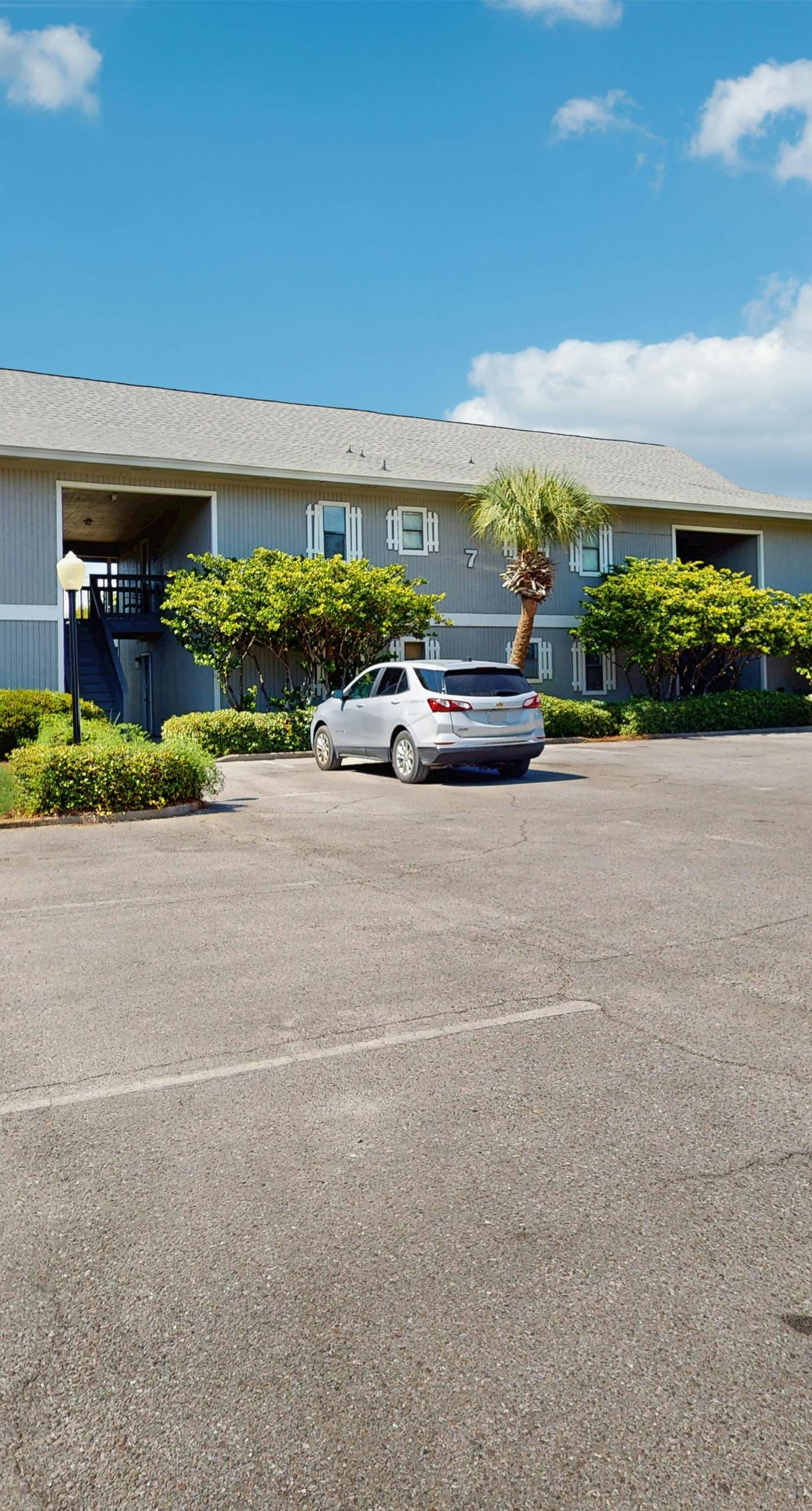 Cute ground floor condo with shared pool, access to shuffleboard and tennis