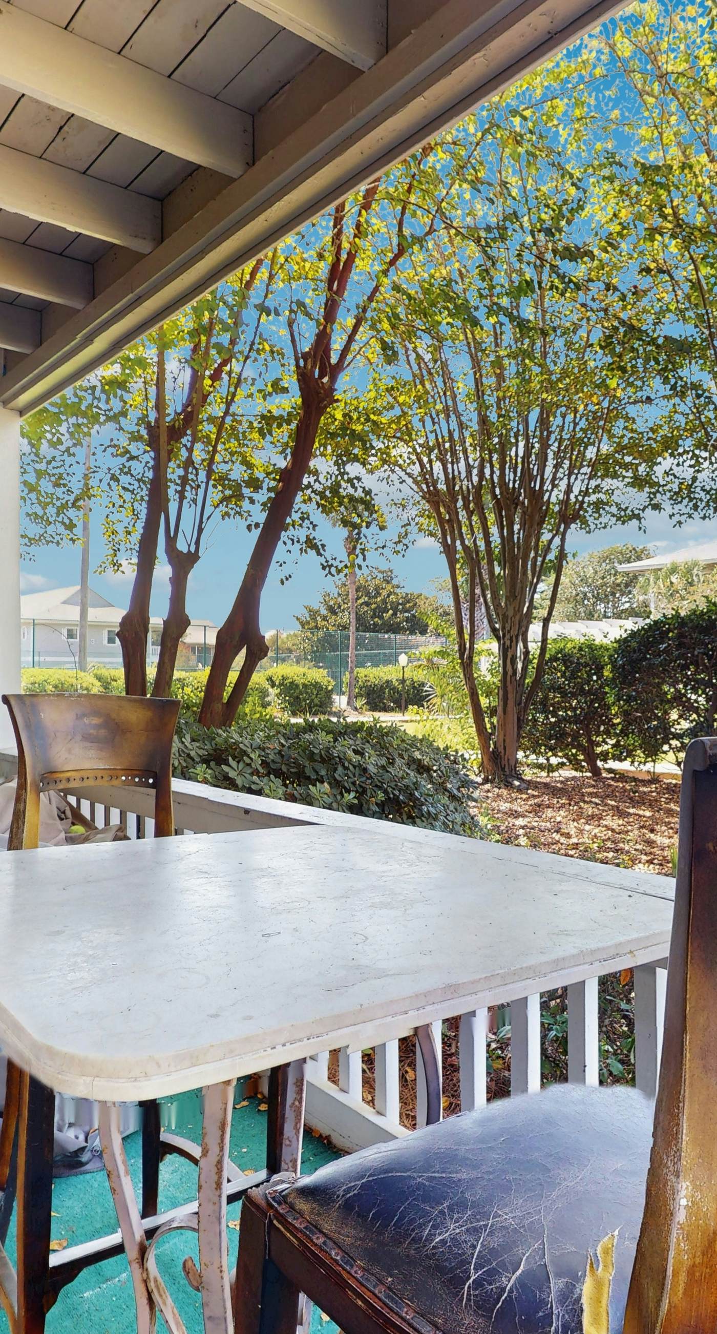 Cute ground floor condo with shared pool, access to shuffleboard and tennis