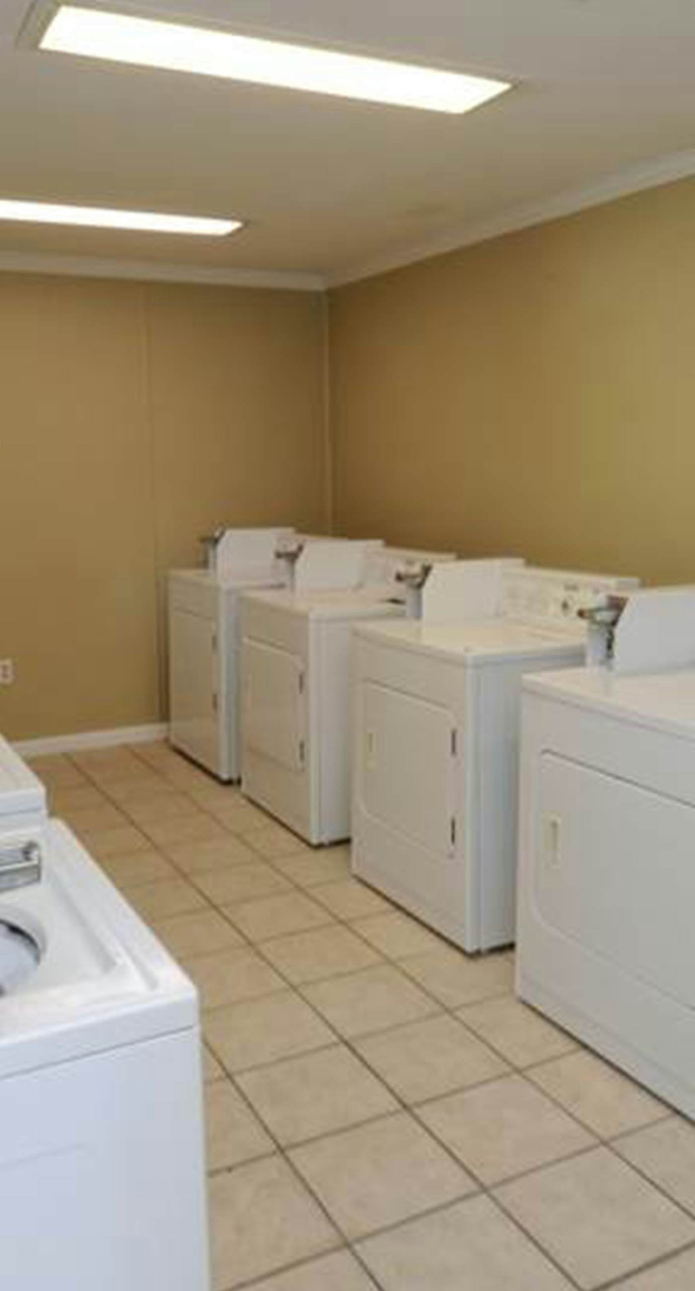 Cute ground floor condo with shared pool, access to shuffleboard and tennis