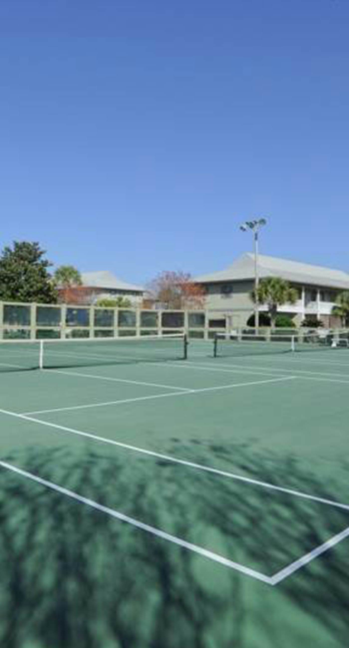 Cute ground floor condo with shared pool, access to shuffleboard and tennis