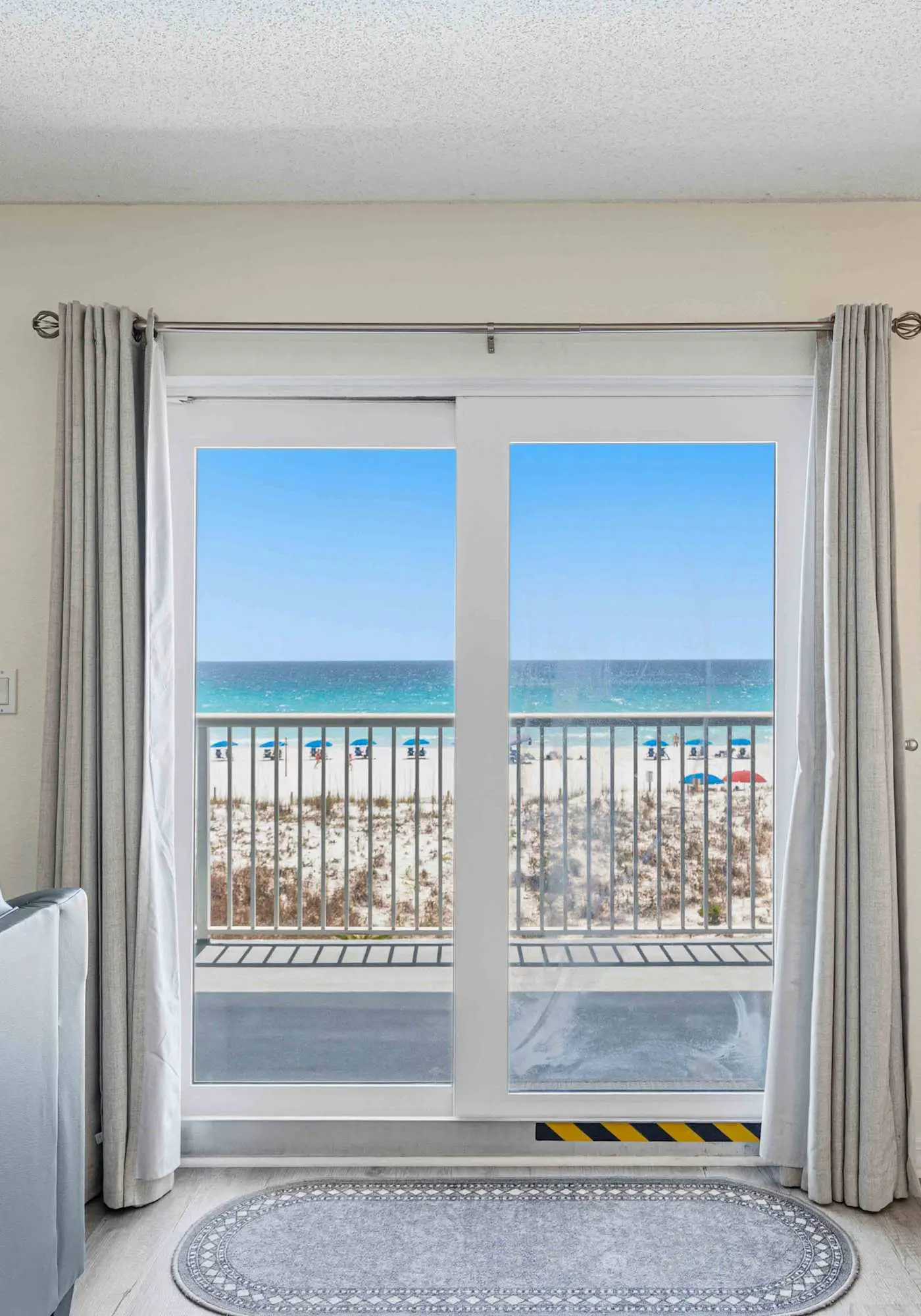 Beachfront condo with ocean & pool views, beach setup included, drive to dining